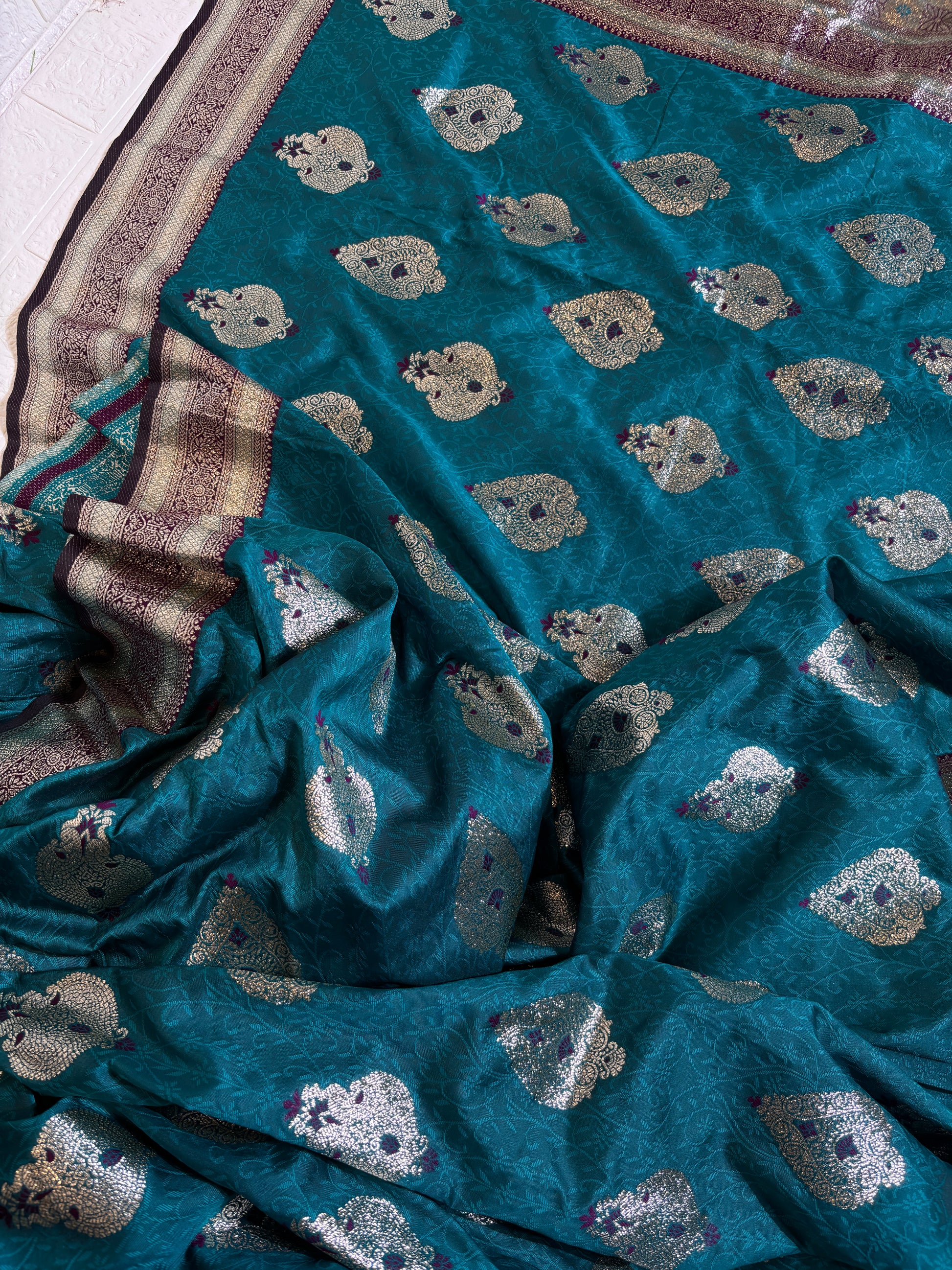 "Teal Blue Banarasi Silk Saree with Silver Zari Buttas"