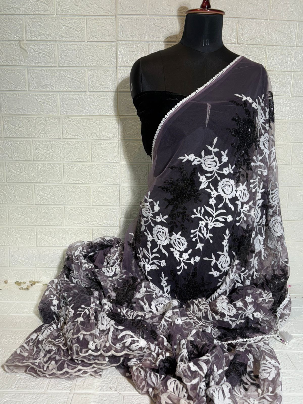 Charcoal Grey Net Saree with White Floral Embroidery and Black Sequin Accents