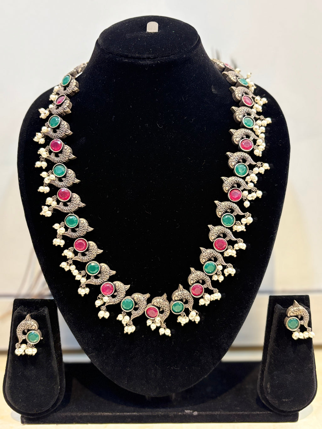 Name: fish Design Oxidized Necklace Set German silver with green and pink stone detailing and pearl drops