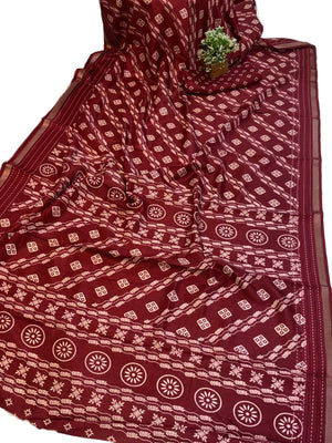 Name: Maroon Traditional Block-Print Saree
Fabric: Soft cotton silk with all-over hand-block style motifs and printed pallu border