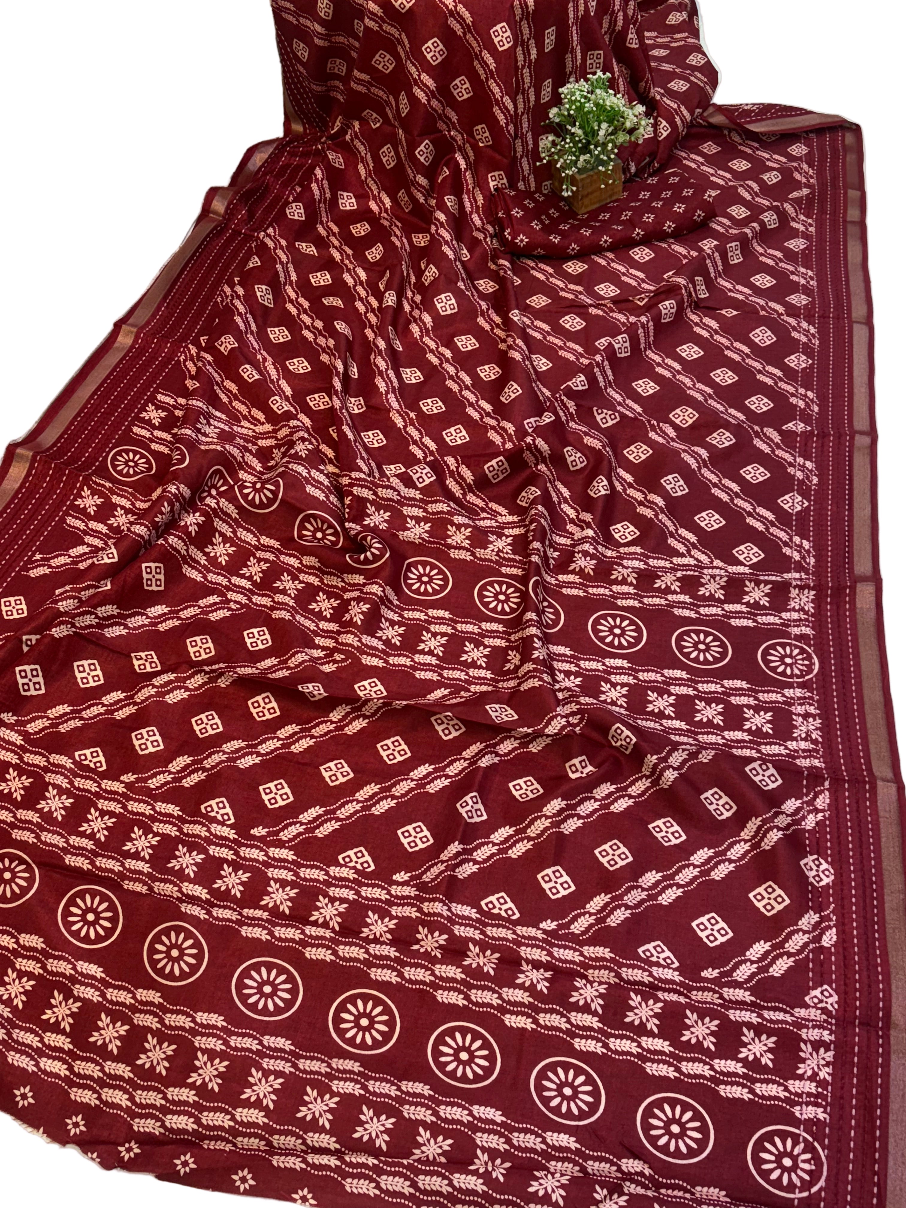 Name: Maroon Traditional Block-Print Saree
Fabric: Soft cotton silk with all-over hand-block style motifs and printed pallu border