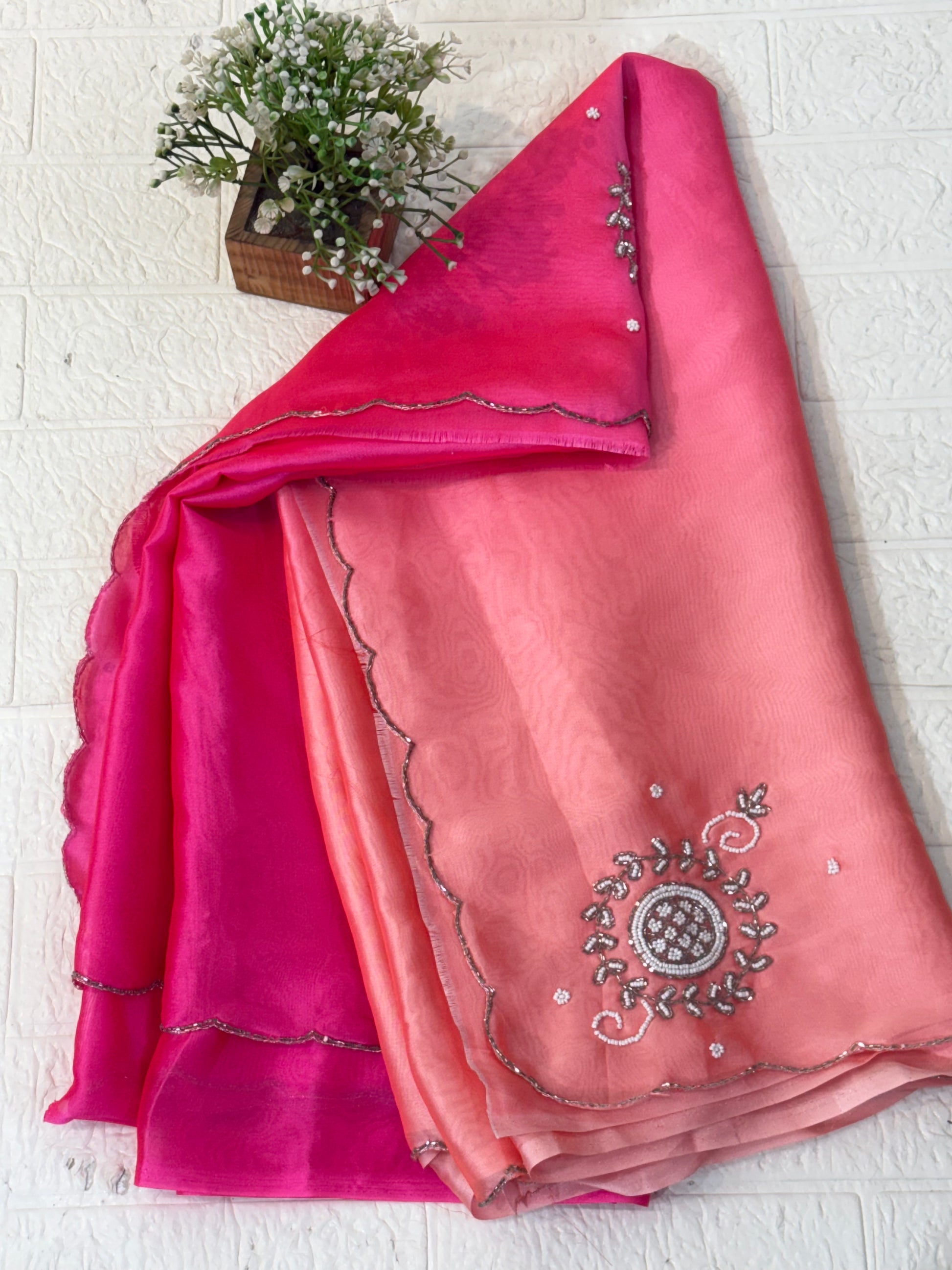 Rose Ombre Pearl Saree
Crafted in lightweight soft crepe fabric, this saree features a graceful two shaded saree pink-to-peach ombre finish with delicate pearl butti work for an elegant, flowy look.