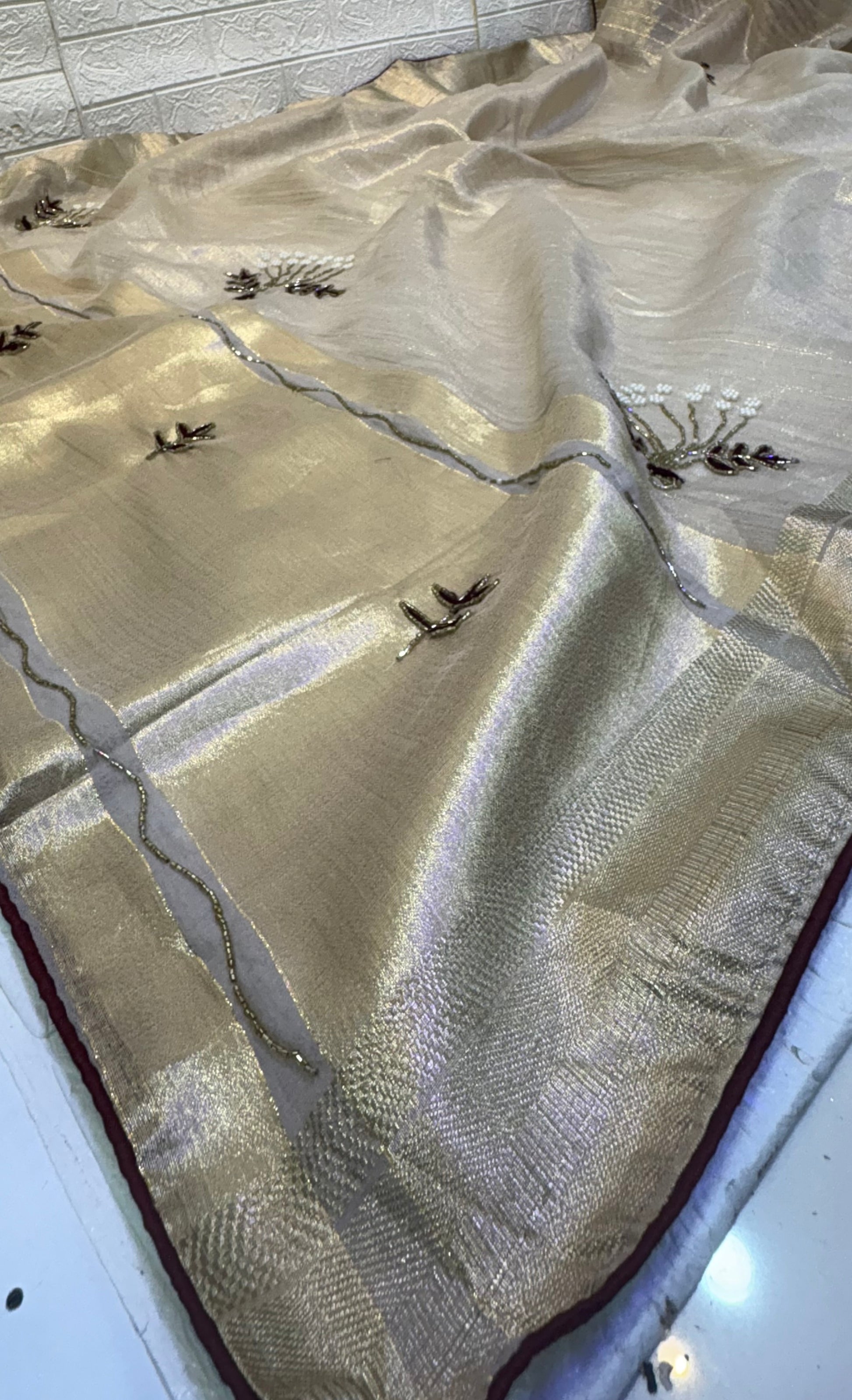 Name: Champagne Gold cotton Shimmering tissue silk fabric with delicate thread and bead floral embroidery, exuding an elegant festive charm.
