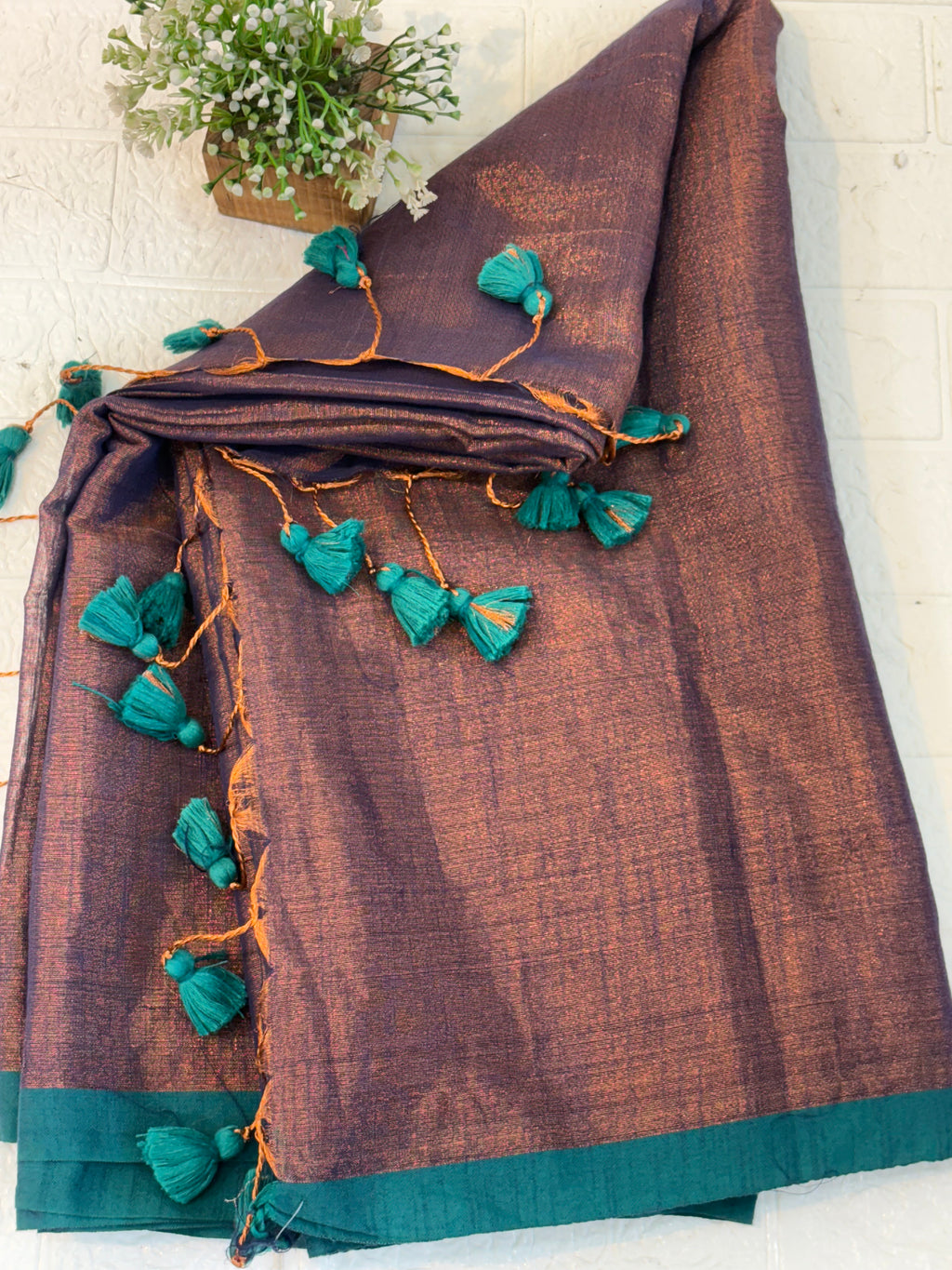 Name: Dual Tone  cotton shimmering Silk Saree Pure with a subtle copper and violet sheen, featuring a green border.