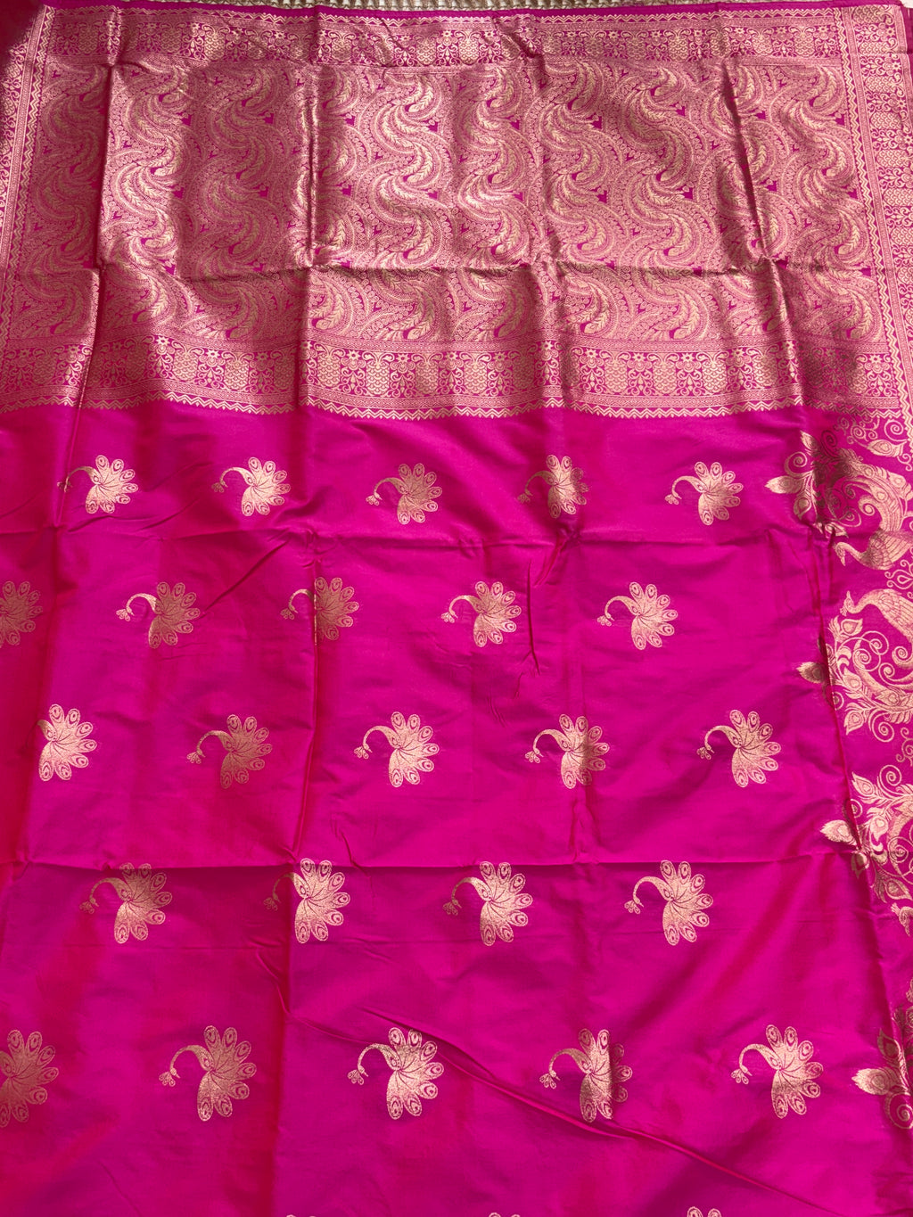 Name: Banarasi Silk Brocade Saree Silk with intricate Zari (metallic thread) Brocade weaving. (The specific silk is often Katan Silk or a silk blend) sarees are best for festival
