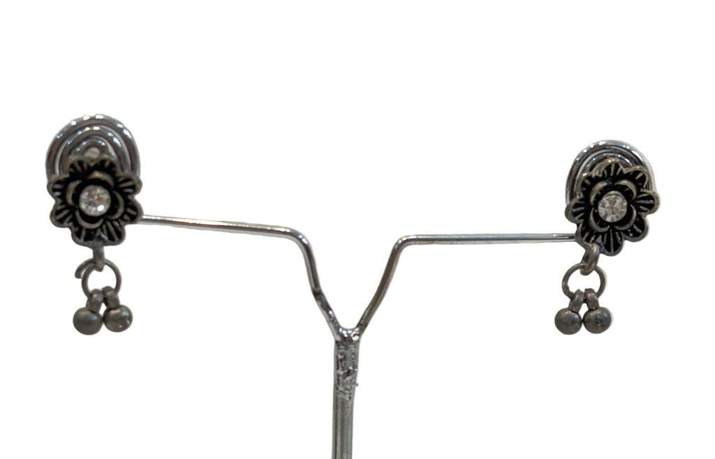 Name: Floral Oxidized Silver Necklace Set Crafted in German silver with antique finish and dangling bead accents