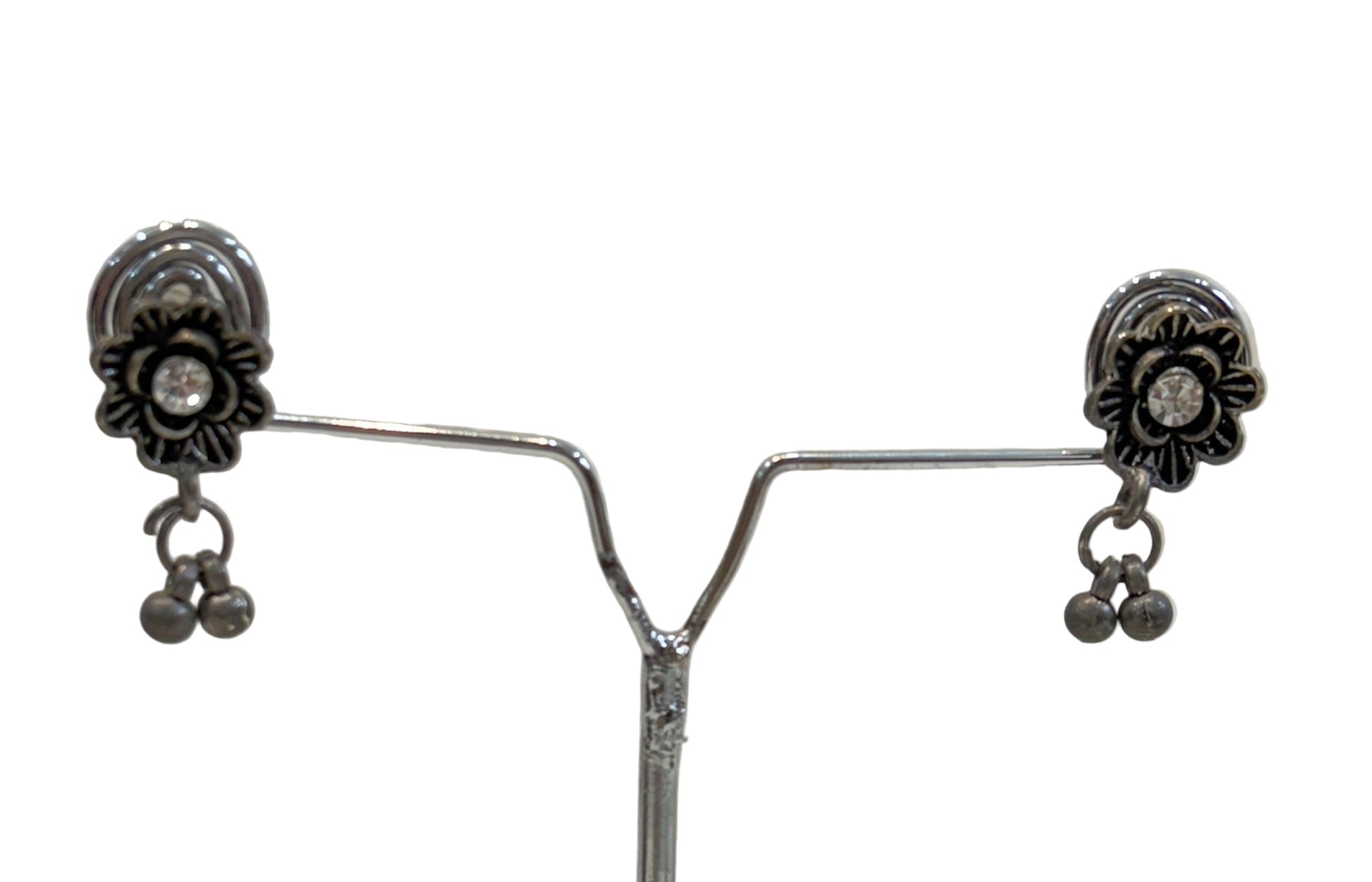 Name: Floral Oxidized Silver Necklace Set Crafted in German silver with antique finish and dangling bead accents