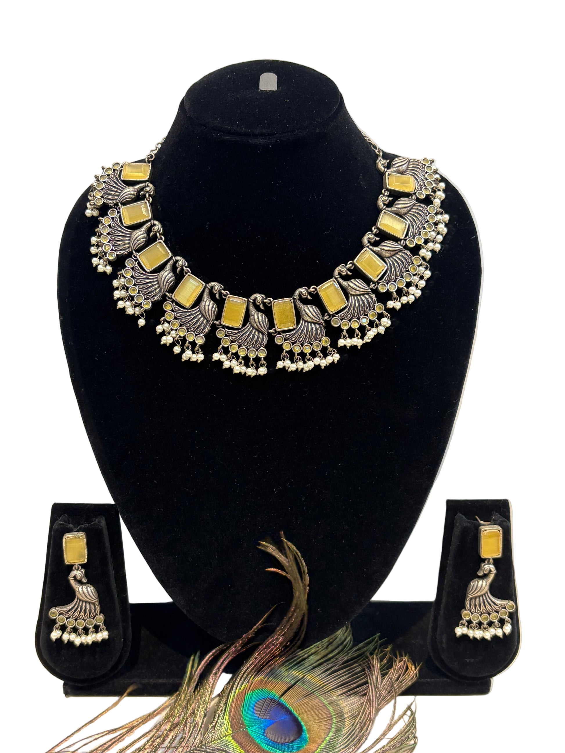 Name: Antique Peacock Motif Necklace Set German silver with golden mirror stones and pearl bead detailing