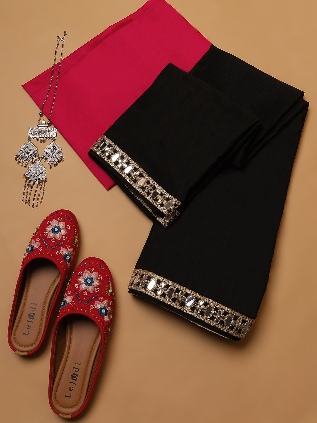 Black Georgette Saree with Mirror Work Border & Contrast Pink Blouse