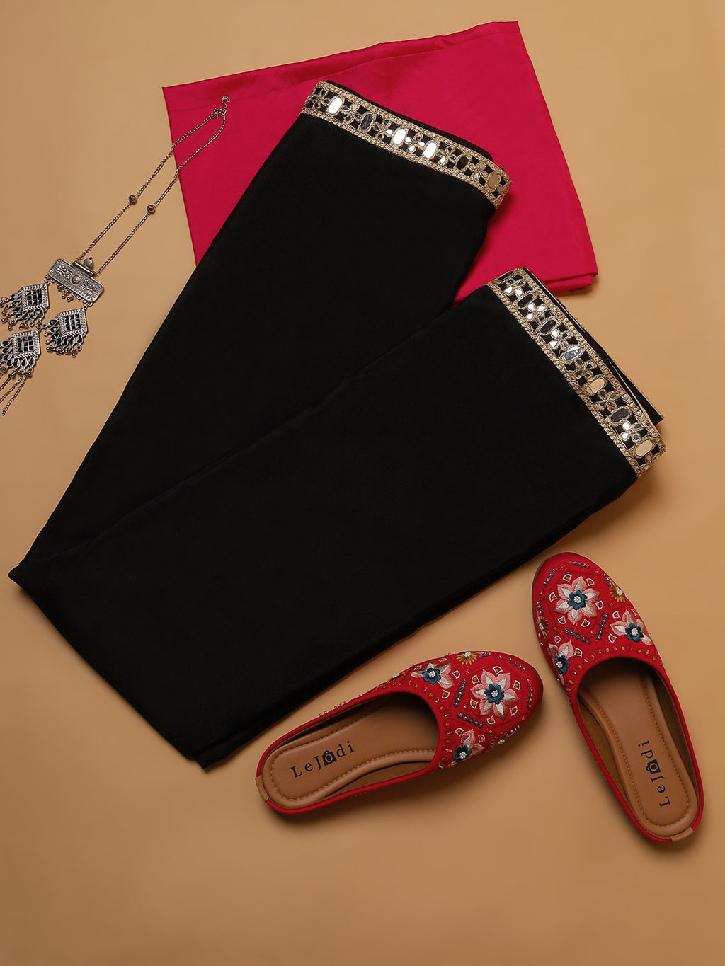 Black Georgette Saree with Mirror Work Border & Contrast Pink Blouse