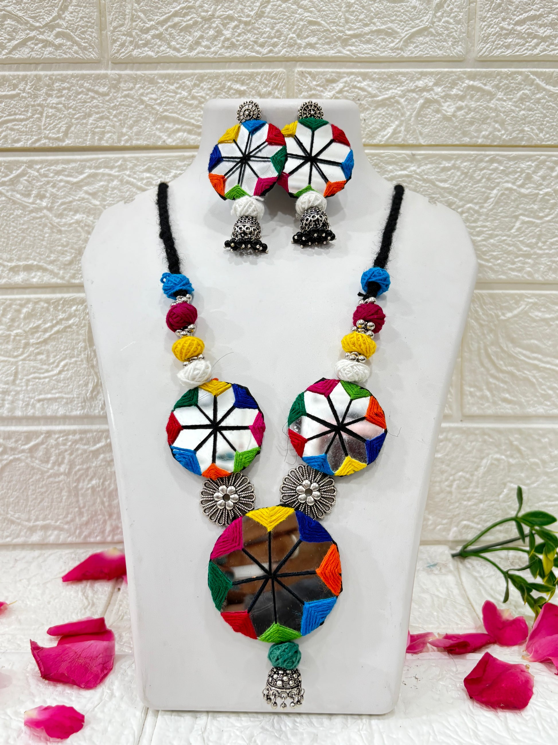 Name:
Multicolor Mirror Work Thread Necklace Set with Earrings

Collection:
Navratri & Festive Jewelry Collection
(or you could call it Boho Mirror Work Collection if you want a more trendy vibe)