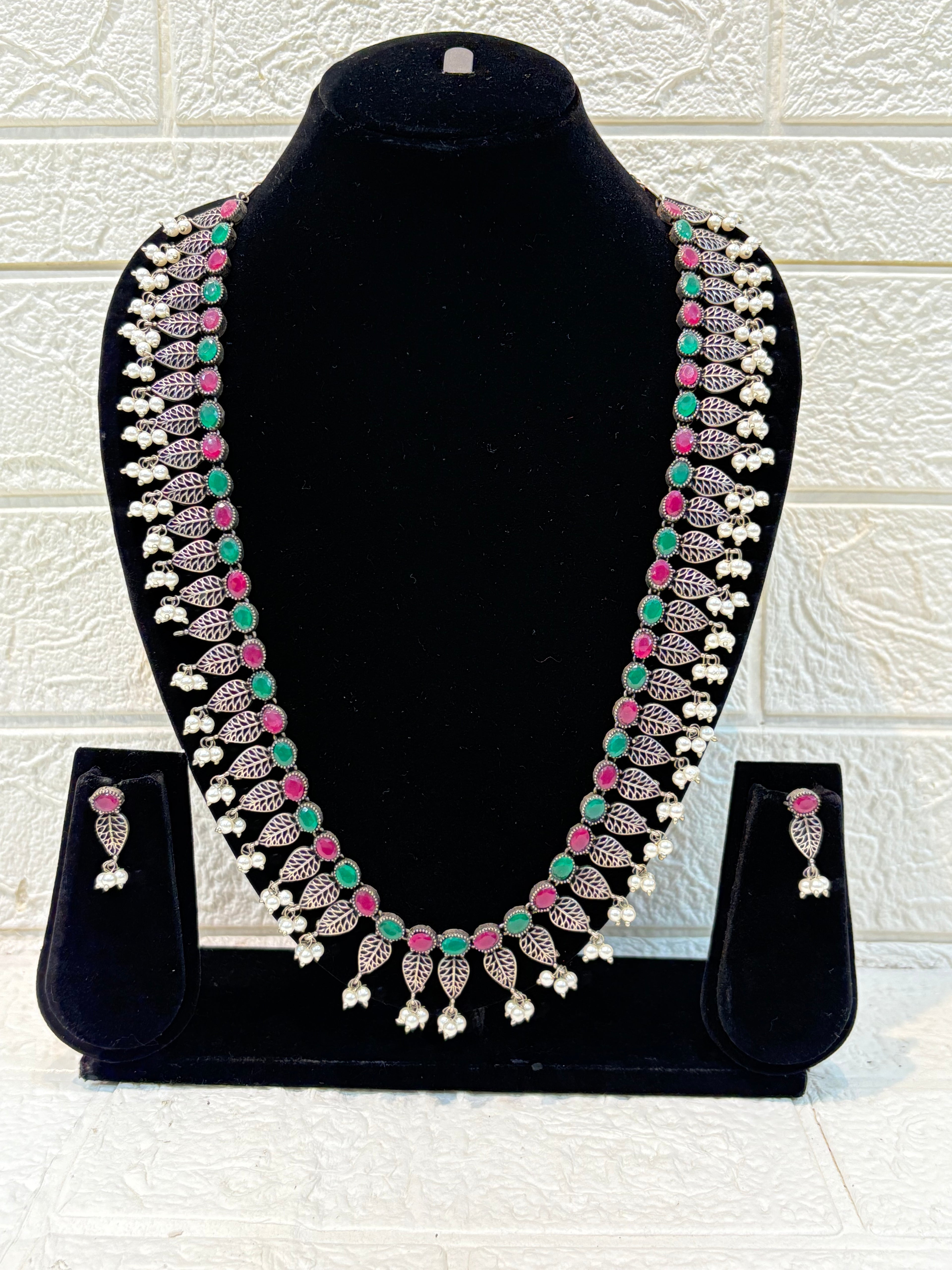 Name: Traditional Silver Plated Long Necklace Set Oxidized silver metal with green and pink stone accents and pearl bead drops