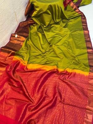 Name: Lime Green & Red Kanjivaram-Style Saree
Fabric: Soft silk blend with a rich, glossy zari-woven border