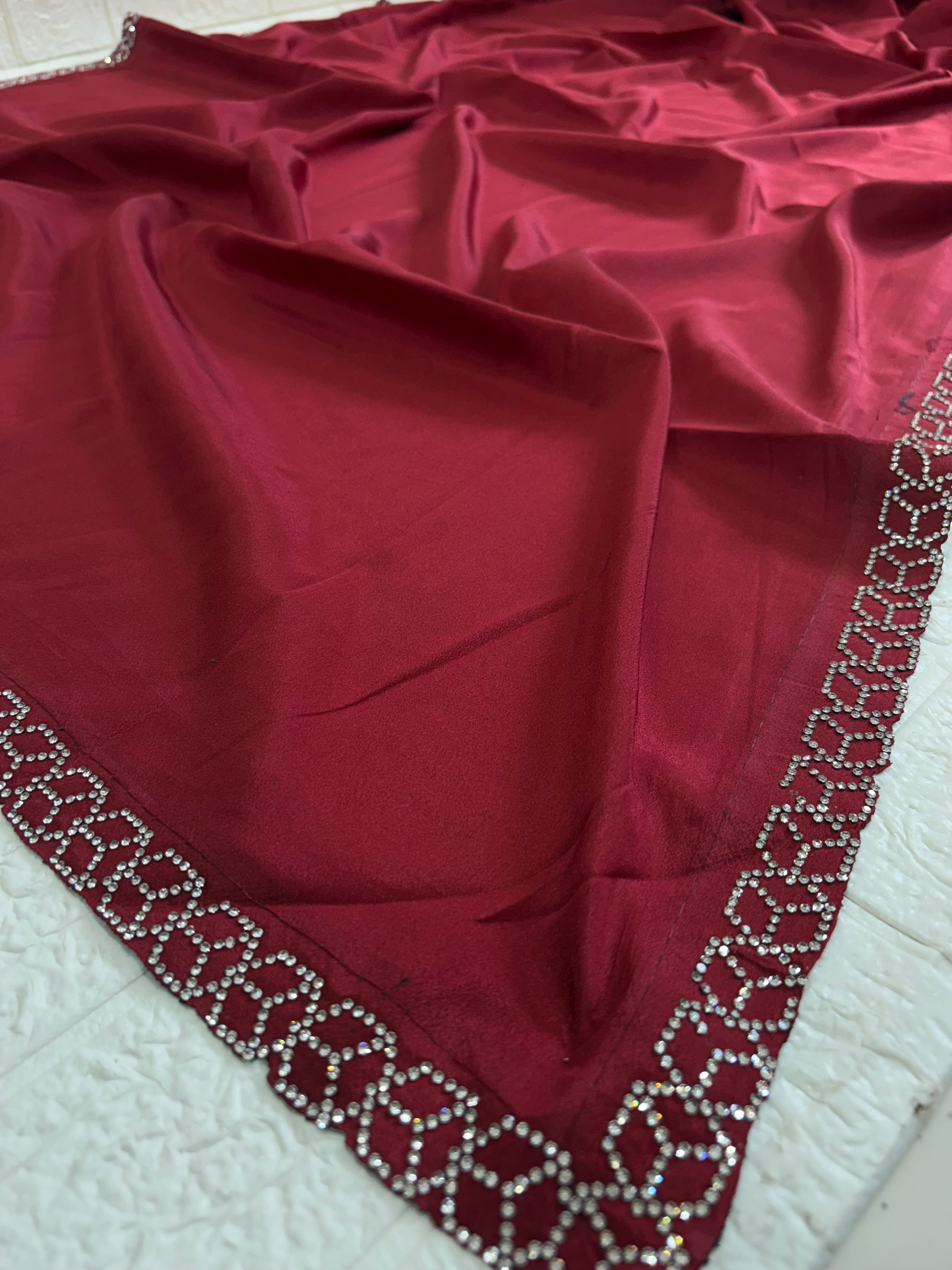 Name: Maroon Saree with  diamond border in saree with crepe silk fabric featuring a delicate  border for an elegant minimal look.