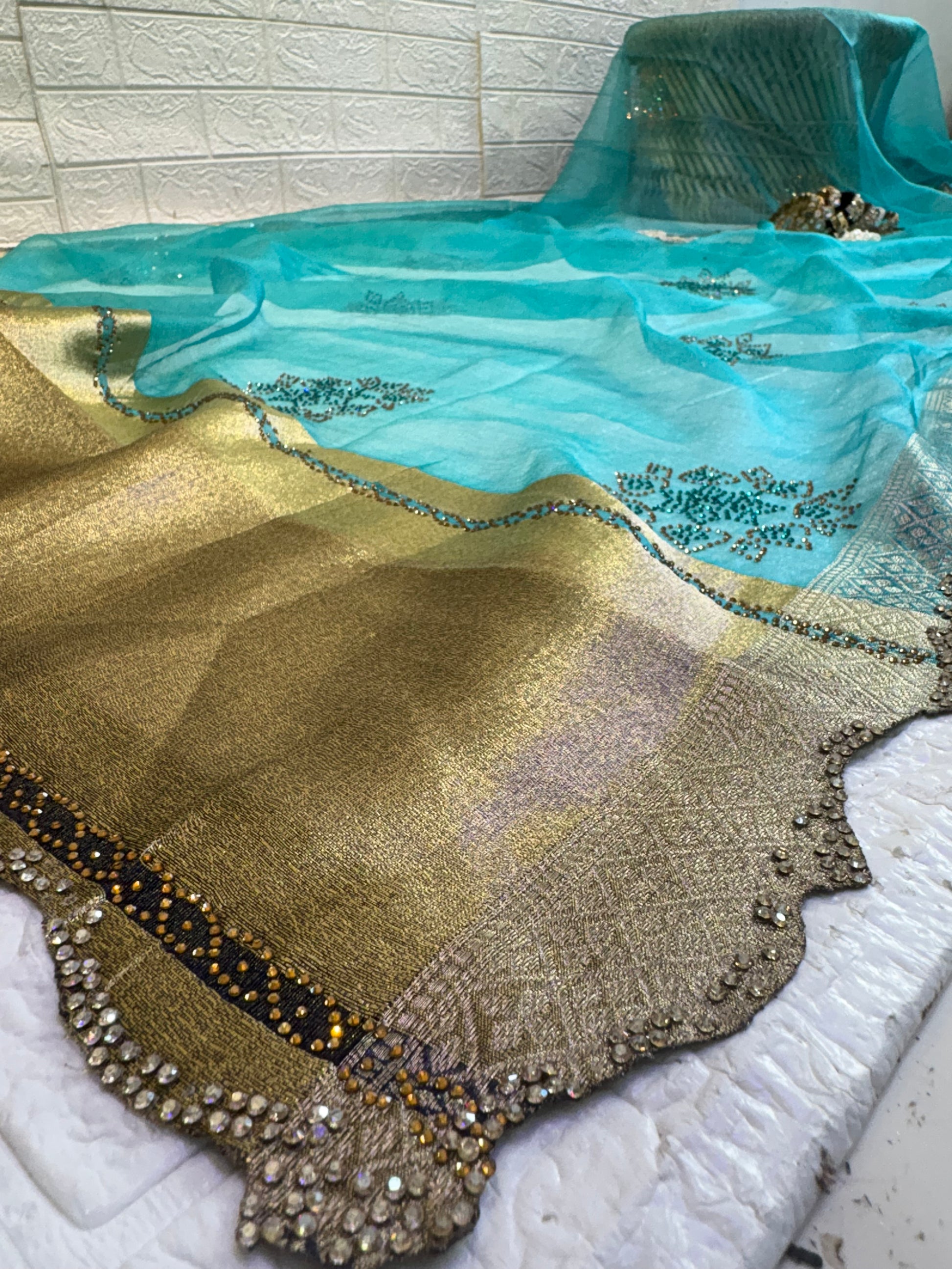 Name: Sea Green cotton silk Saree Lightweight silk with intricate sequin floral motifs and rich zari-woven border, perfect for elegant festive wear.