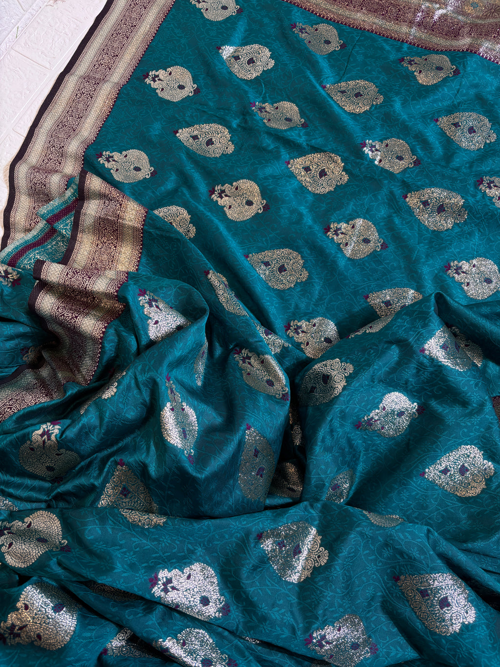 "Teal Blue Banarasi Silk Saree with Silver Zari Buttas"