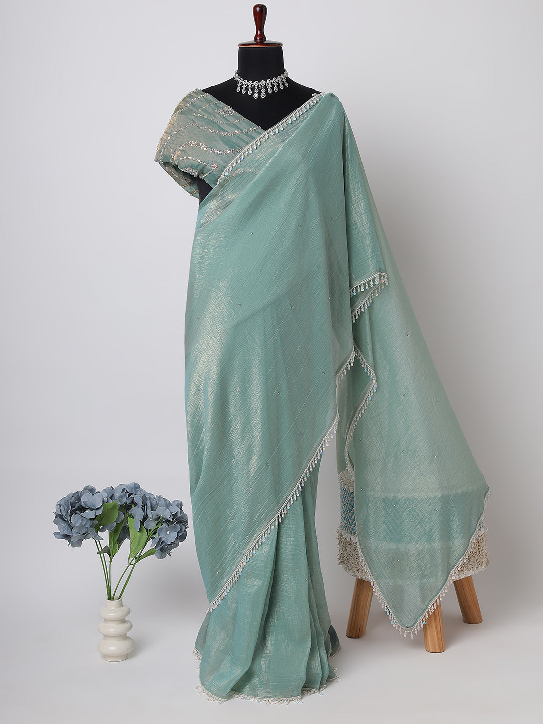 Pastel Green Handwoven Organza Saree with Silver Embellishments