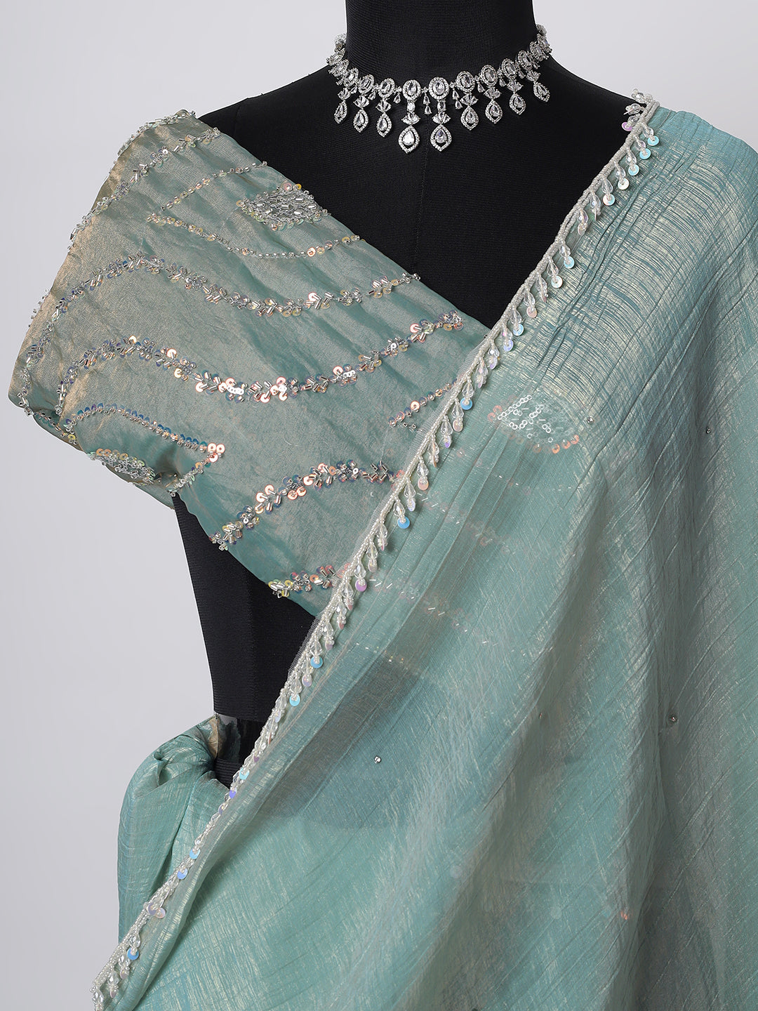 Pastel Green Handwoven Organza Saree with Silver Embellishments