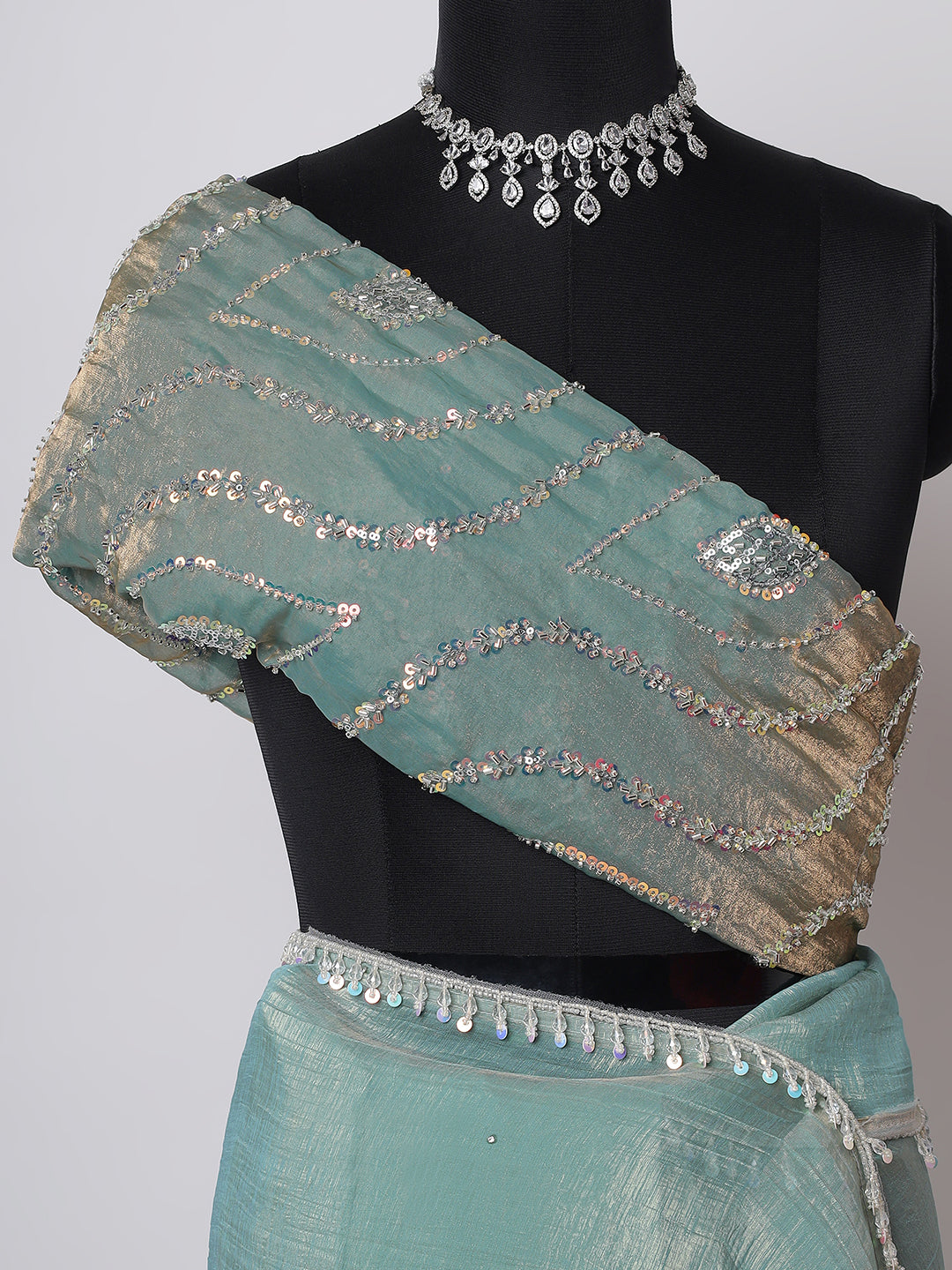 Pastel Green Handwoven Organza Saree with Silver Embellishments