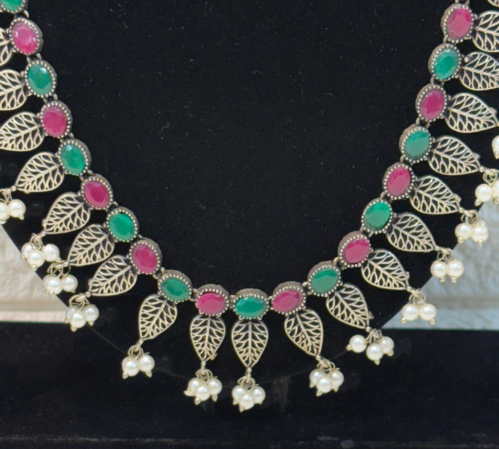 Name: Traditional Silver Plated Long Necklace Set Oxidized silver metal with green and pink stone accents and pearl bead drops