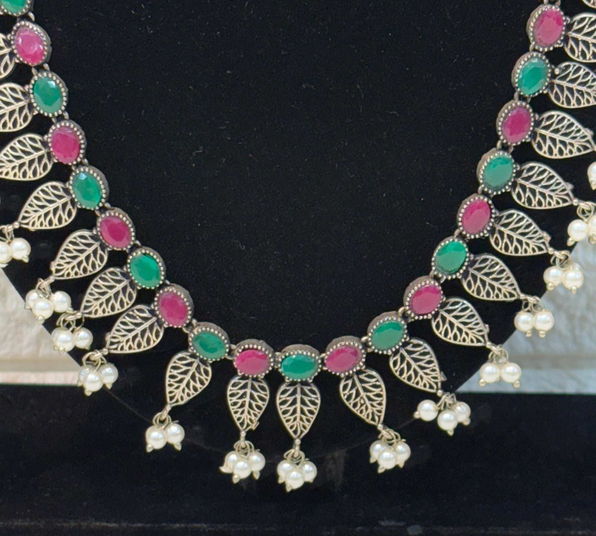 Name: Traditional Silver Plated Long Necklace Set Oxidized silver metal with green and pink stone accents and pearl bead drops