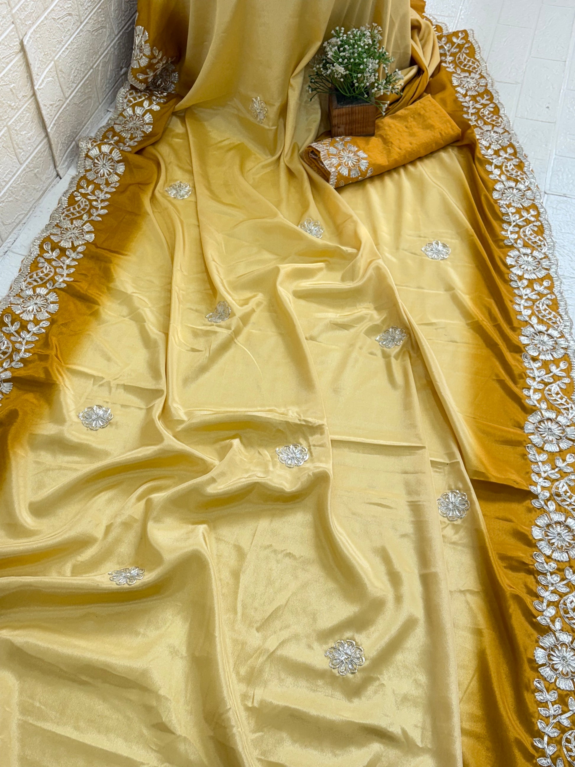 Name: Golden Embroidered Saree with crepe silk intricate white floral gota Patti lace work in silver colour embroidery on the border and motifs across the drape.