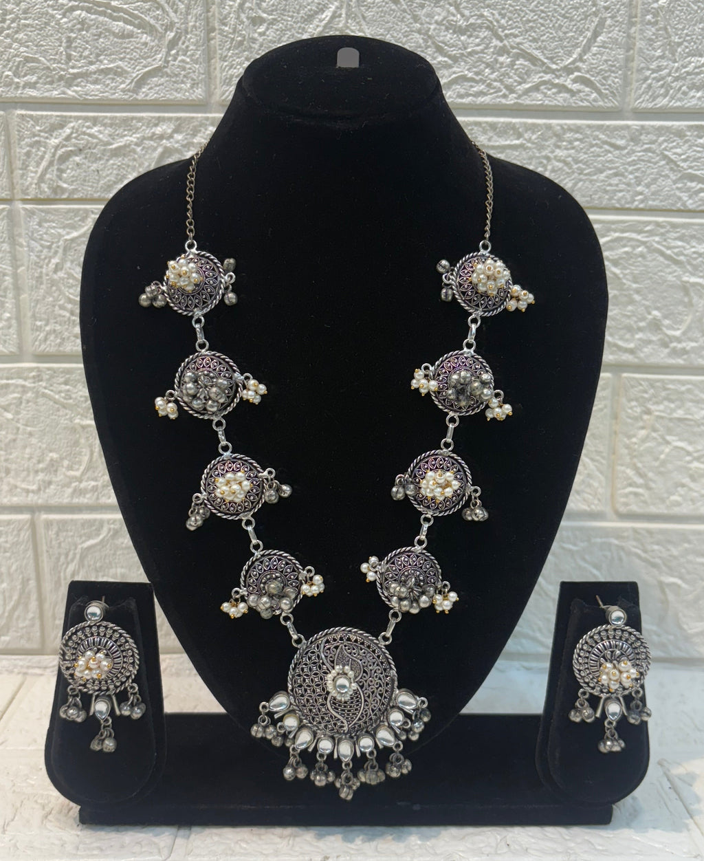 Name: Antique Oxidized Circular Necklace Set German silver with intricate filigree work and pearl bead detailing