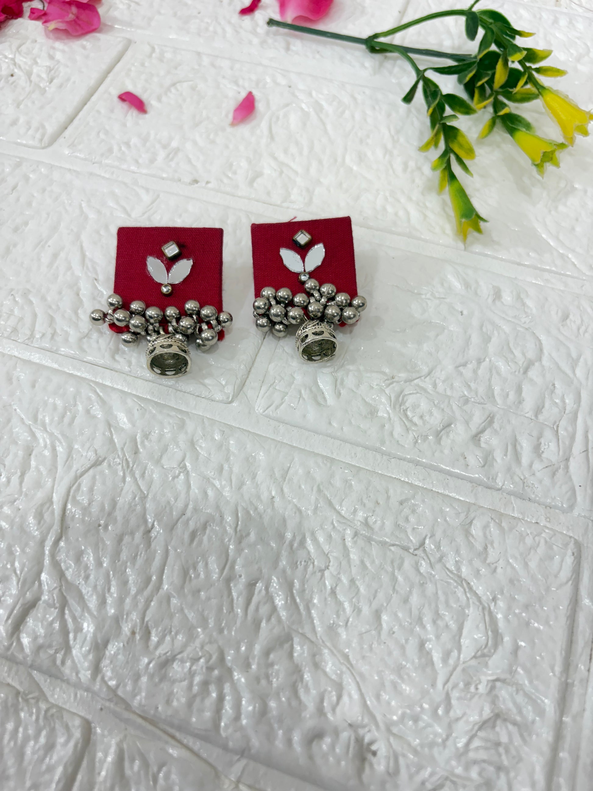 Name:
Red Fabric Pendant Necklace Set with Oxidized Silver Beads & Mirror Work

Collection:
Boho Oxidized Jewelry Collection
(or if you want a festive vibe: Navratri Special Fabric Jewelry Collection)