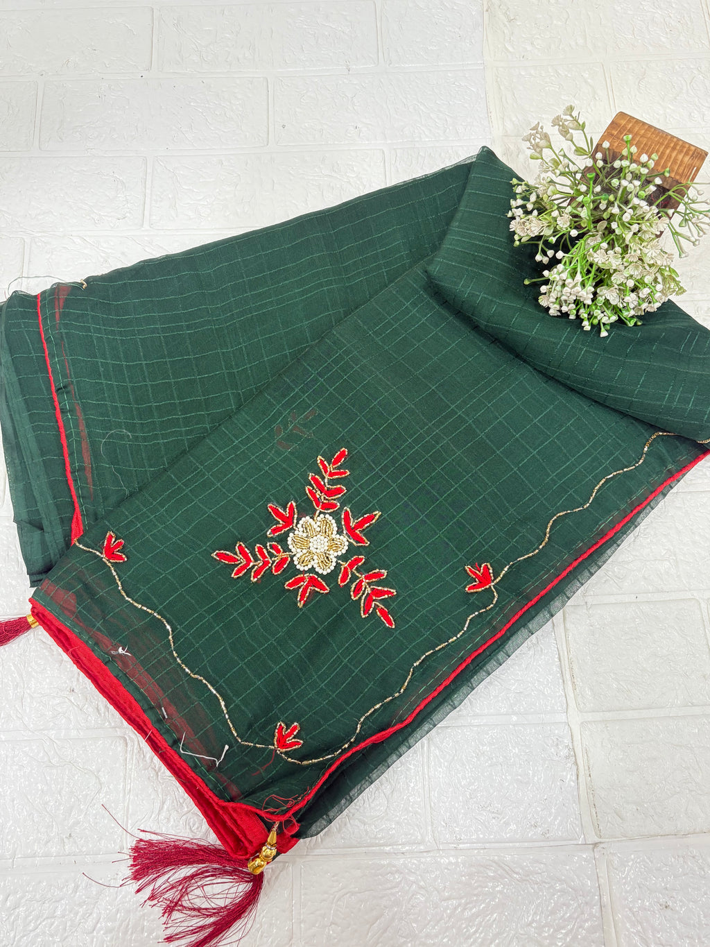 Lightweight green shimmer soft georgette self texture with embroider featuring delicate thread embroidery and red plain blouse perfect for festival