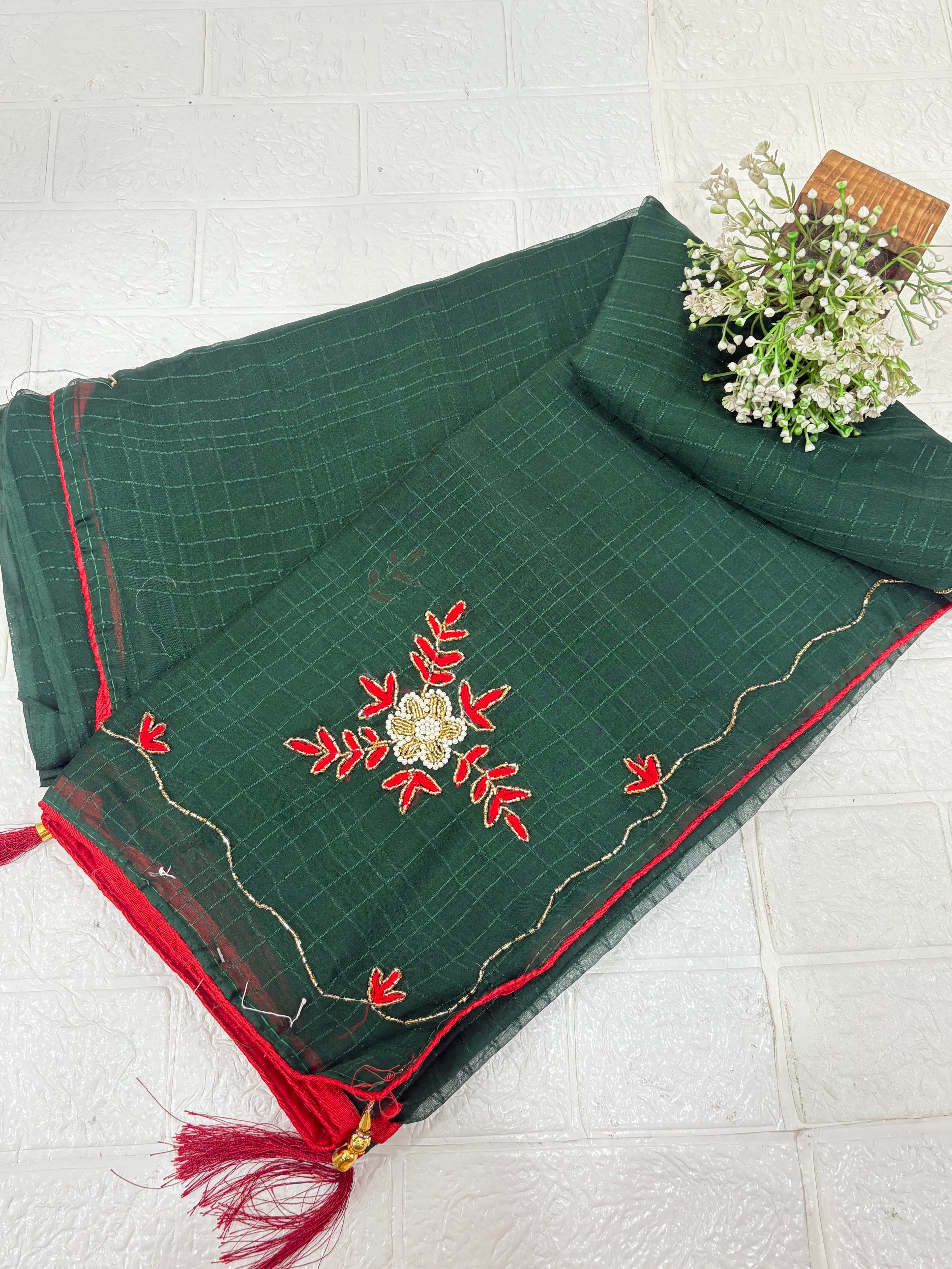 Lightweight green shimmer soft georgette self texture with embroider featuring delicate thread embroidery and red plain blouse perfect for festival