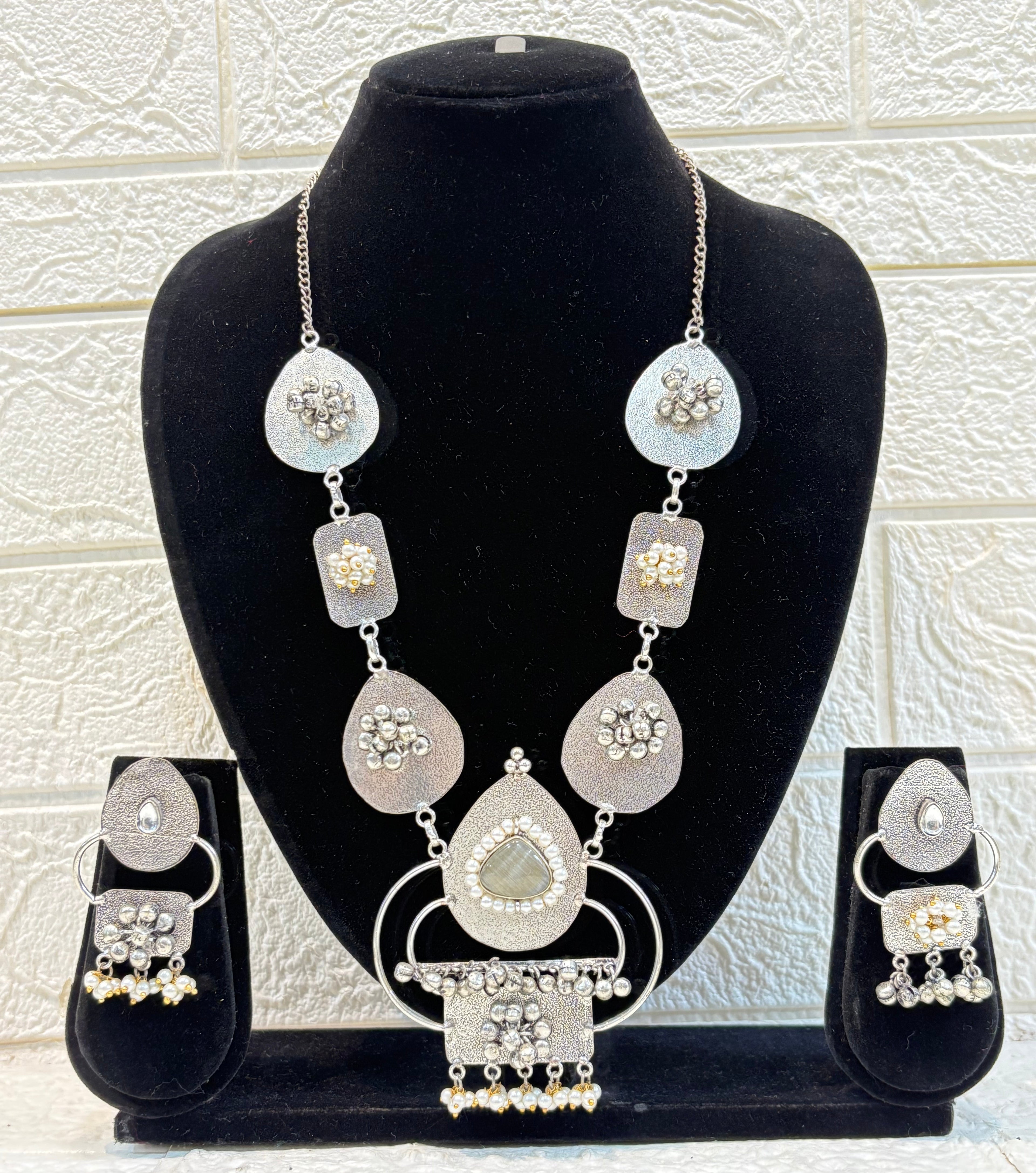 Name: Ethnic Silver Plated Necklace Set Oxidized silver metal with mirror work and pearl bead detailing