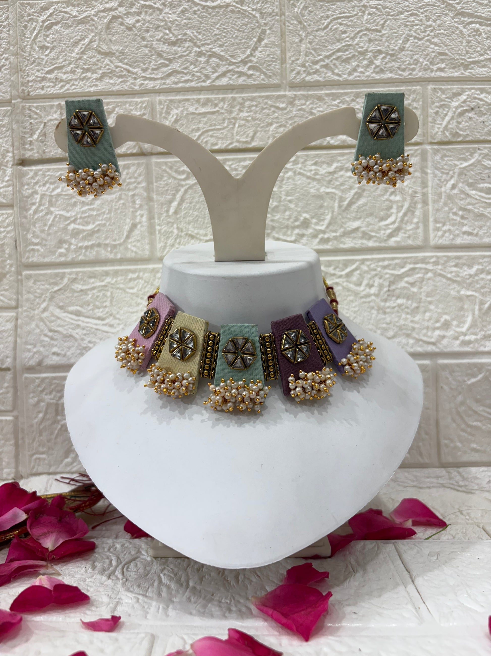 Name: Pastel Kundan Pearl Choker Set

Collection: Elegant Pastel Collection – Handcrafted Kundan & Pearl Jewelry

Would you like me to also create a short product description for your website (highlighting pastel colors, kundan work, and the festive look)