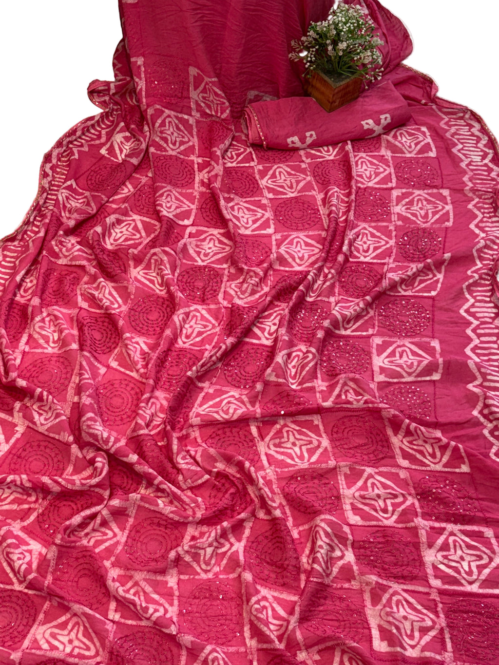 Name: Pink Bandhani Saree
Soft cotton silk with traditional bandhej pattern and sequin embellishments