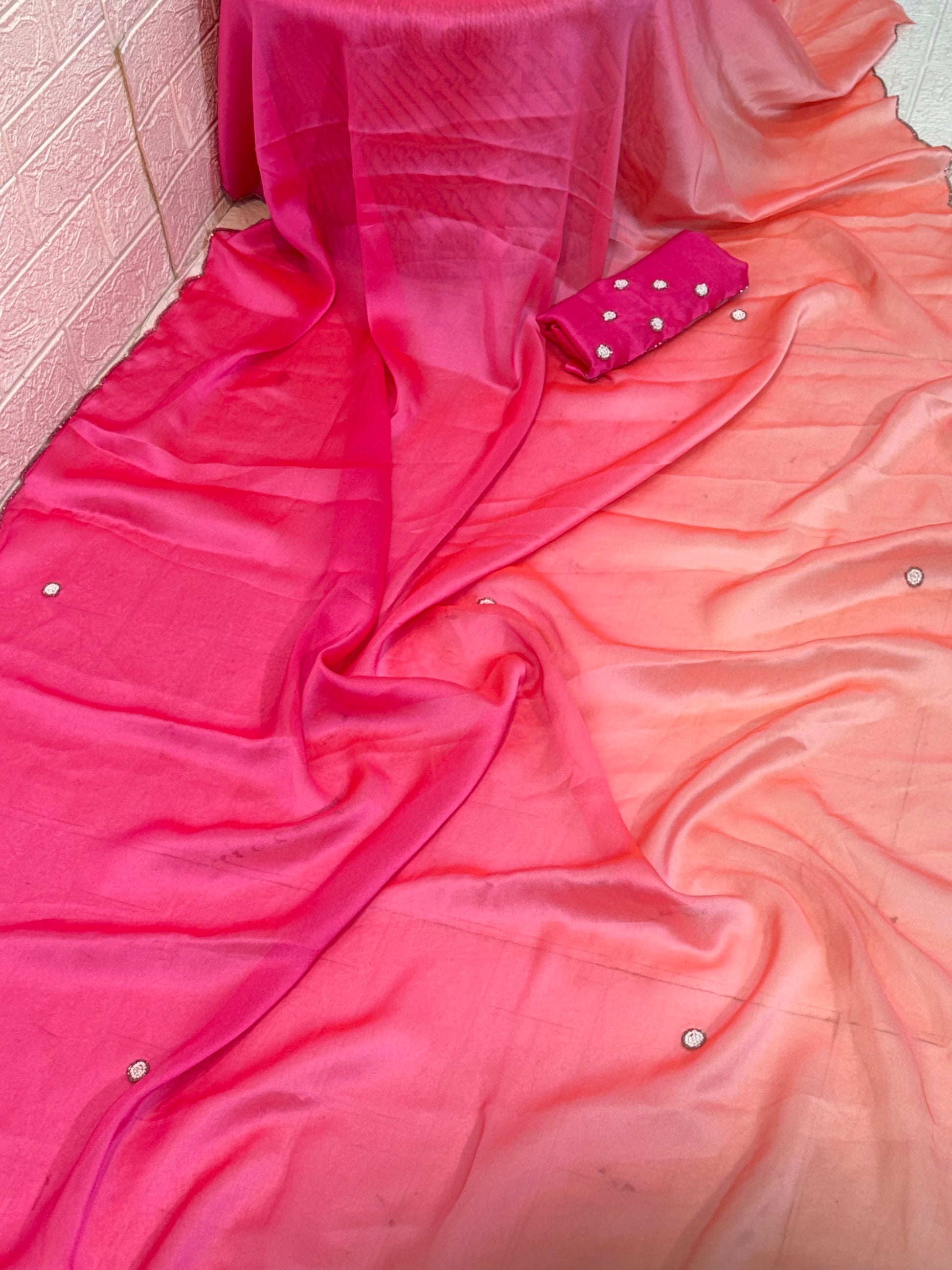 Rose Ombre Pearl Saree
Crafted in lightweight soft crepe fabric, this saree features a graceful two shaded saree pink-to-peach ombre finish with delicate pearl butti work for an elegant, flowy look.