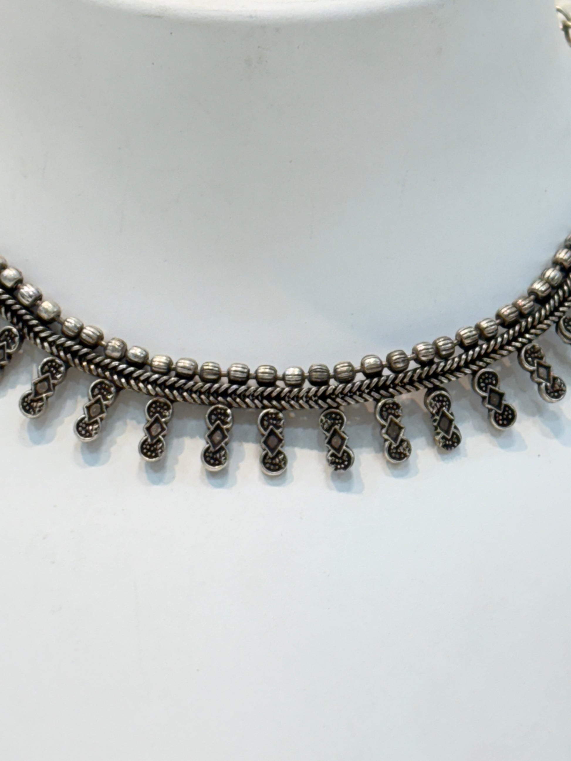 Name: Classic Oxidized Silver Choker Oxidized silver metal with intricate bead and loop detailing