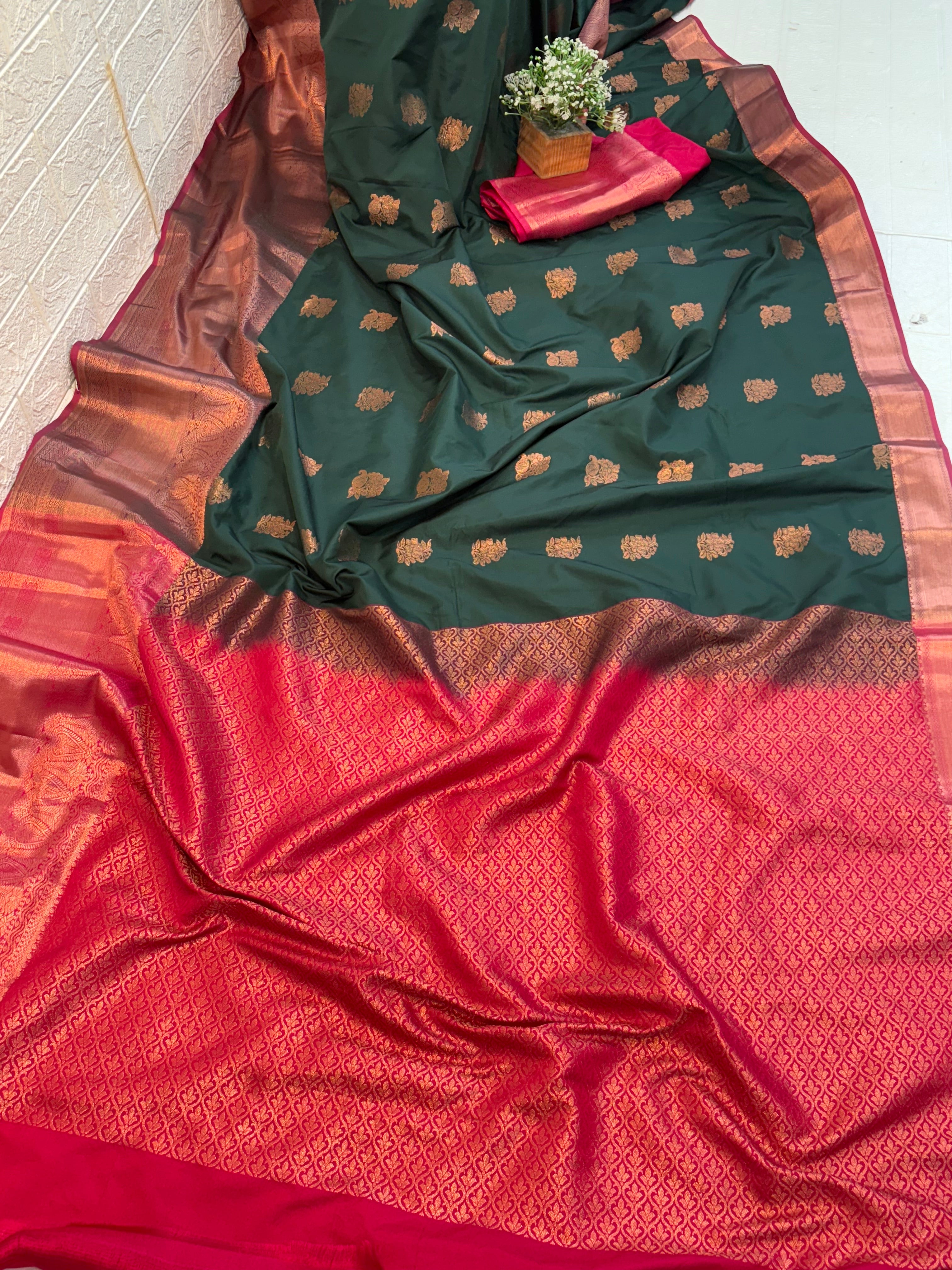 Name: soft silk with rich zari weaving in dark green and maroon contrast copper colour border and pallu.
