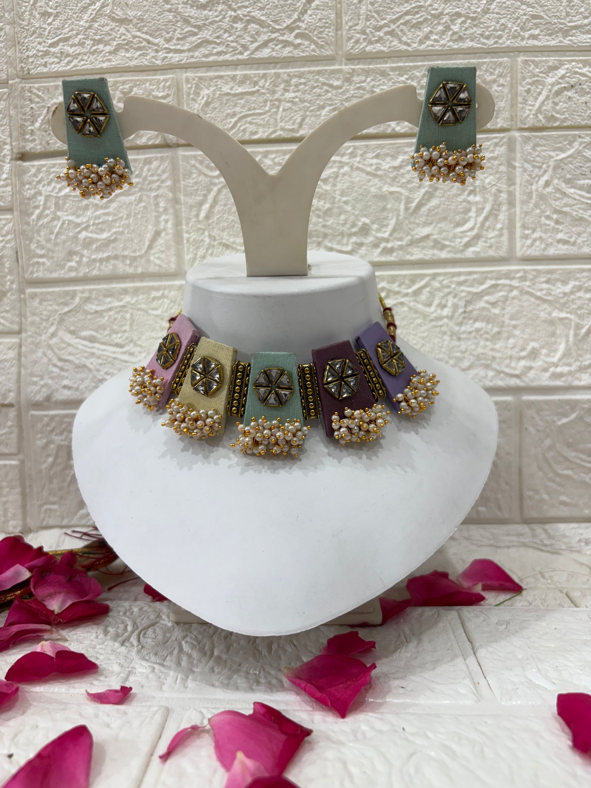 Name: Pastel Kundan Pearl Choker Set

Collection: Elegant Pastel Collection – Handcrafted Kundan & Pearl Jewelry

Would you like me to also create a short product description for your website (highlighting pastel colors, kundan work, and the festive look)