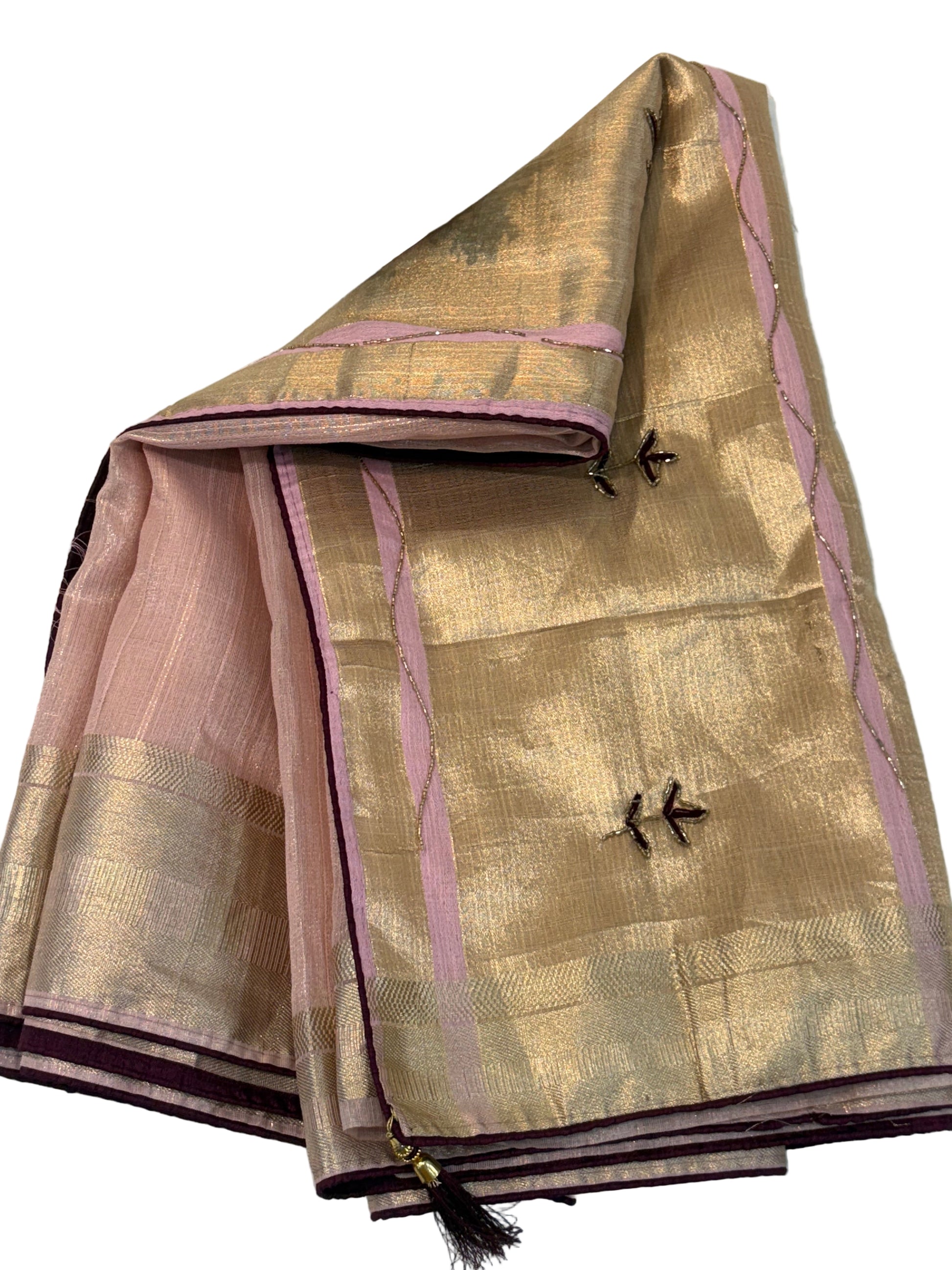 Name: Soft Pastel Pink cotton  shimmering tissue silk fabric 
with delicate zari border and subtle hand-embroidered motifs