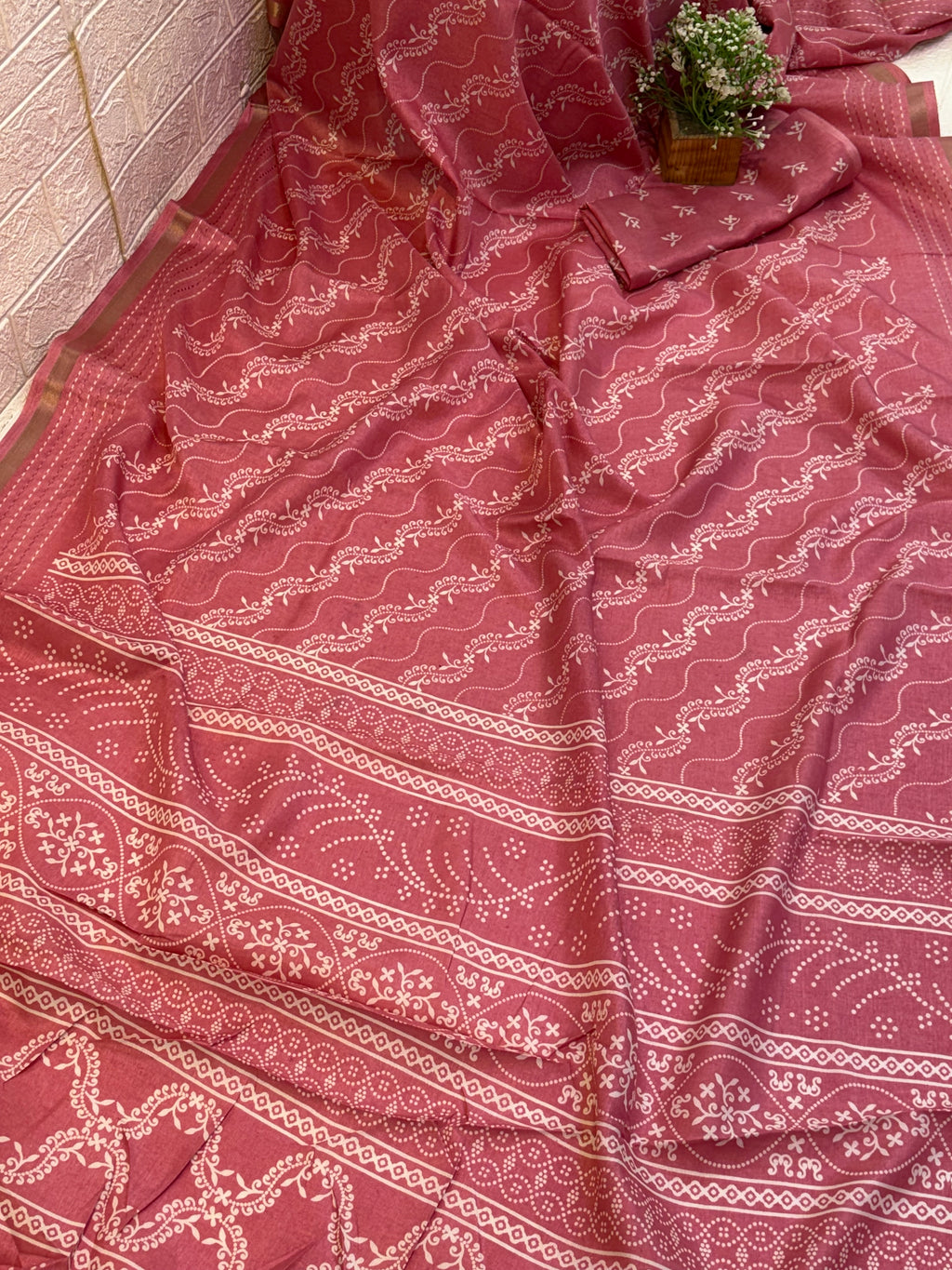 Name: Dusty Rose Handblock Printed Saree
Fabric: Soft cotton silk blend with intricate white traditional motifs and patterned borders.
