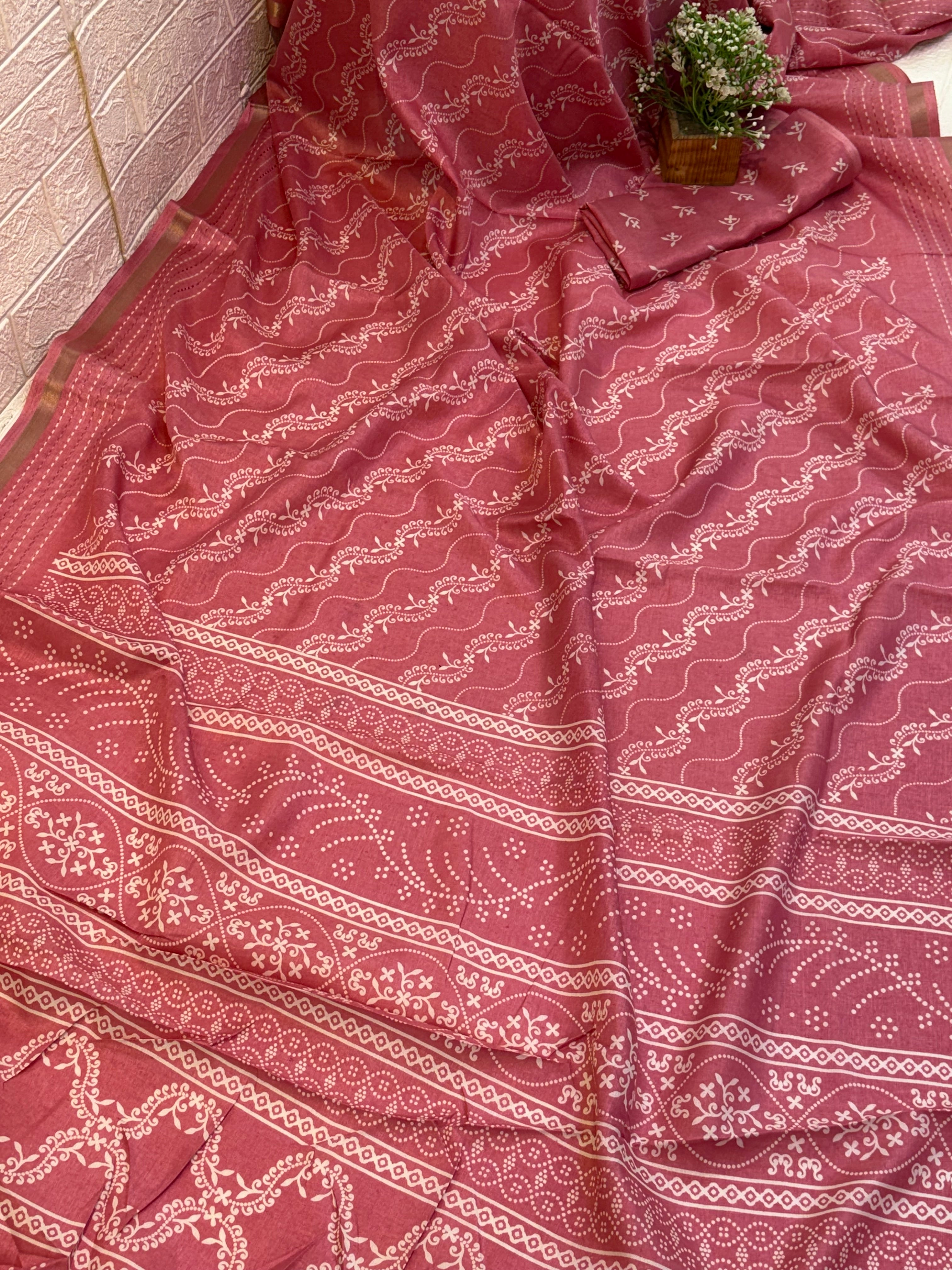 Name: Dusty Rose Handblock Printed Saree
Fabric: Soft cotton silk blend with intricate white traditional motifs and patterned borders.