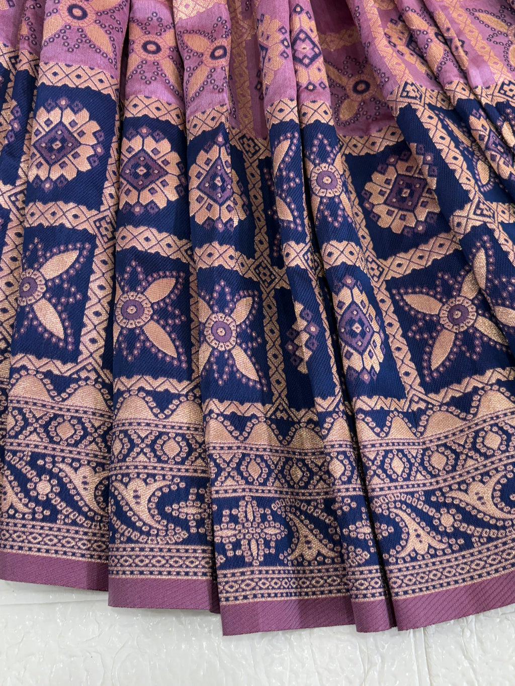 Name Wildberry saree fabric pure art silk blend adorned with traditional block print motifs and a contrasting  blue  border for a timeless ethnic appeal