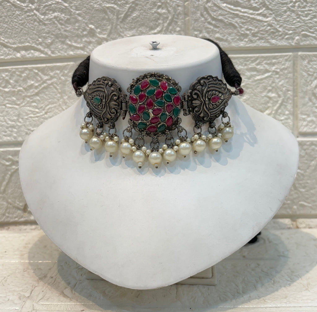 Name: Kundan Stone Oxidized Choker Set German silver with red-green Kundan work and pearl drop embellishments