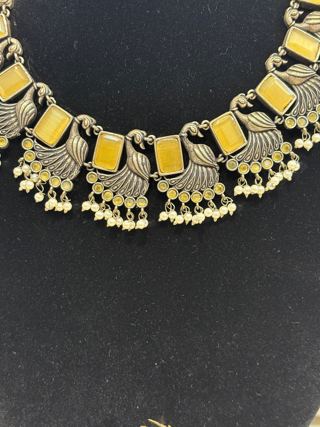 Name: Antique Peacock Motif Necklace Set German silver with golden mirror stones and pearl bead detailing