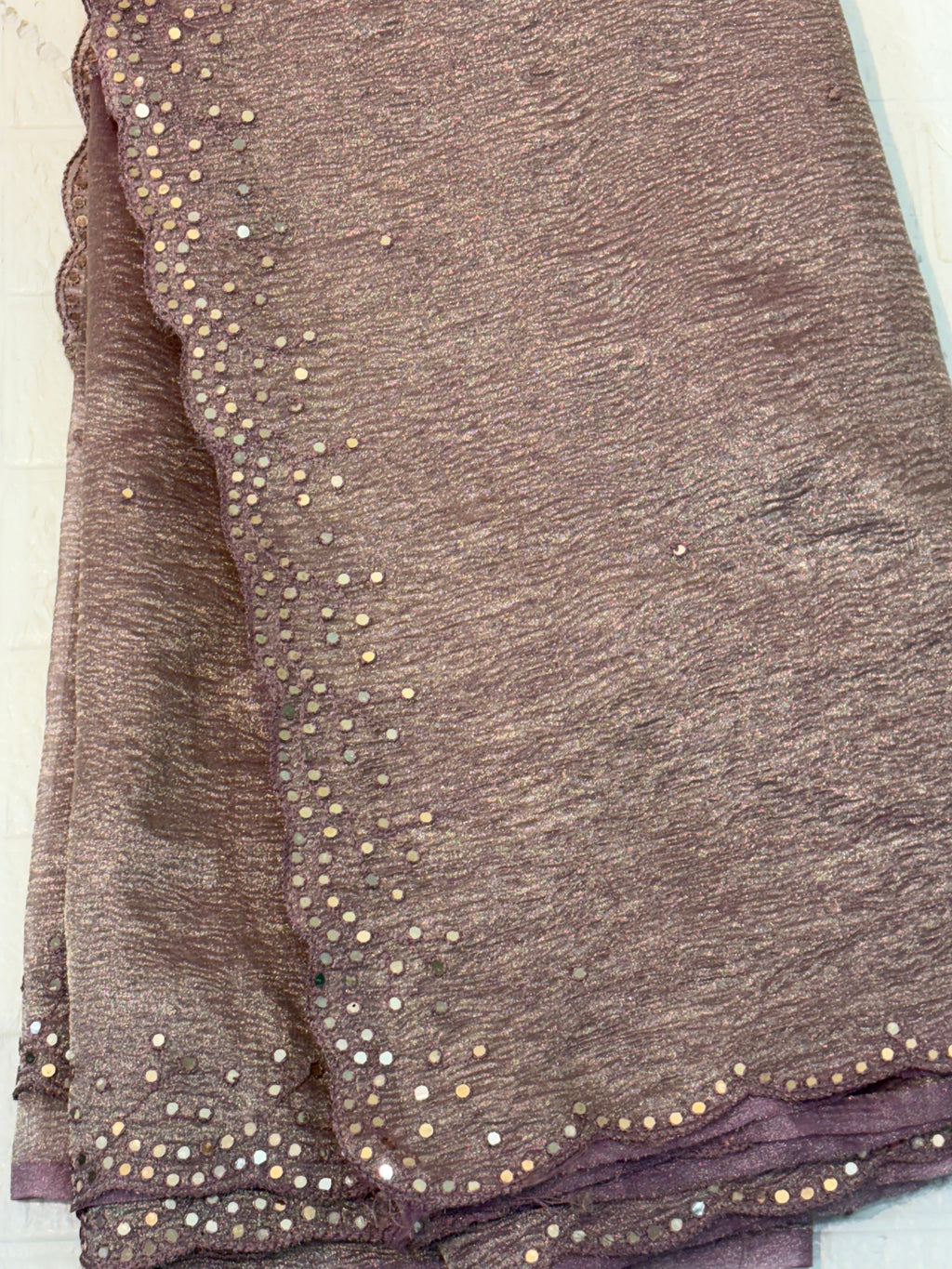 Name: purple gold Mauve crust Tissue Shimmery fabric with subtle sequin embellishments and delicate scalloped lace border