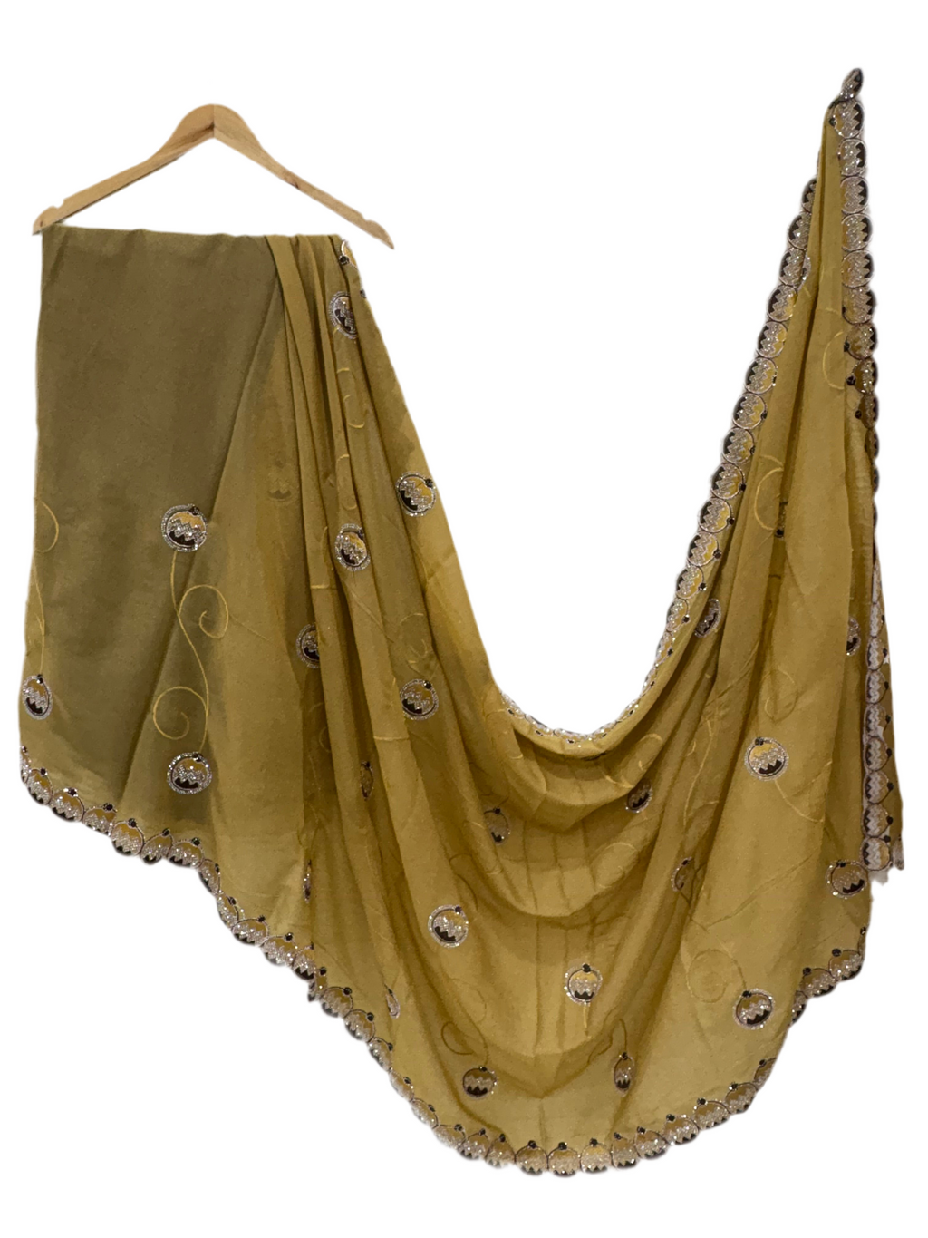 Saree georgette or organza and mustard colour Embroidered Medallion butti and Saree with Scalloped Border it is a sheer saree with scattered embroider and stonework