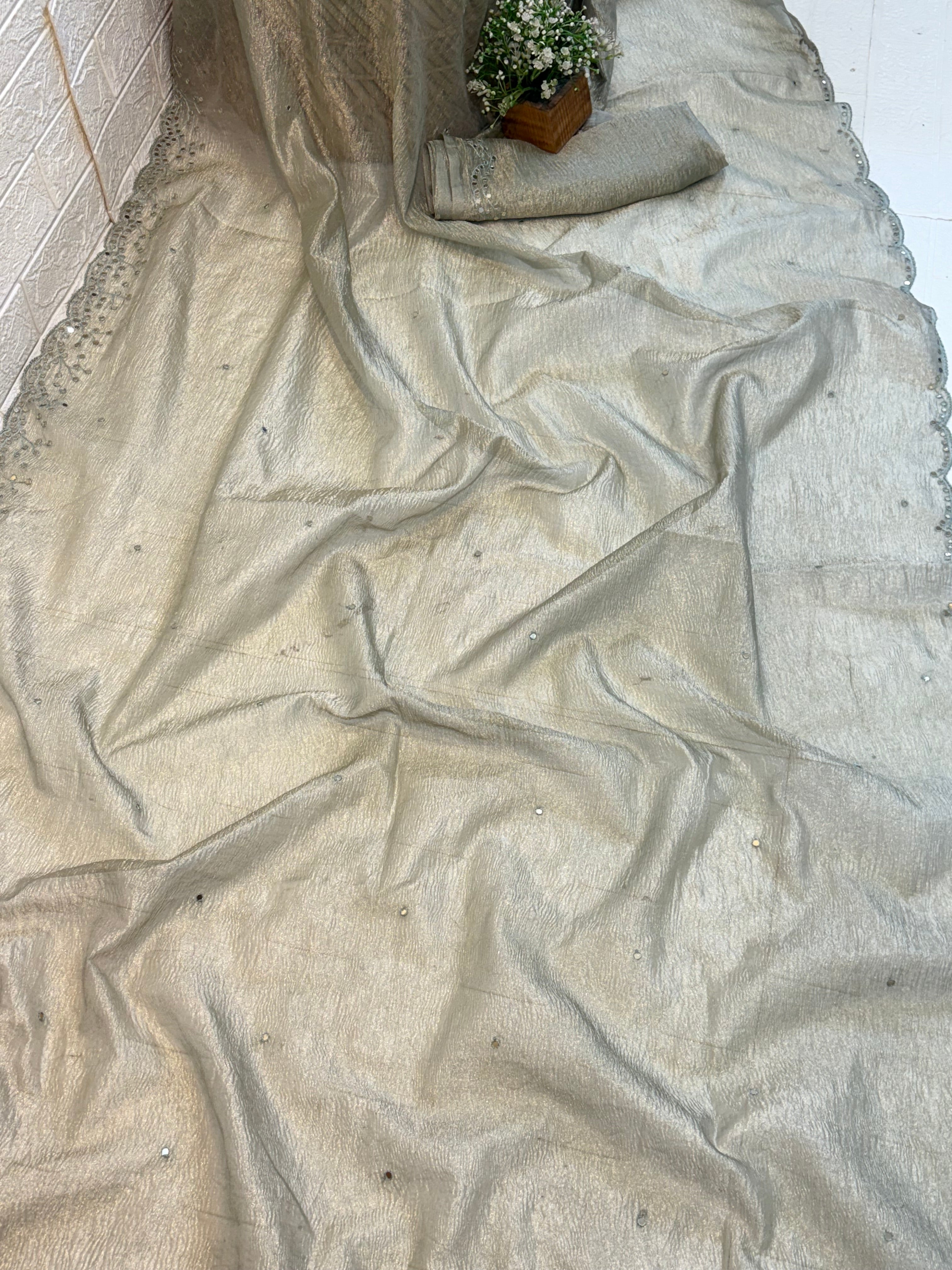 Name: Silver Grey Saree crust tissue fabric with Subtle Embellishments with delicate sequin detailing and scalloped embroidered border