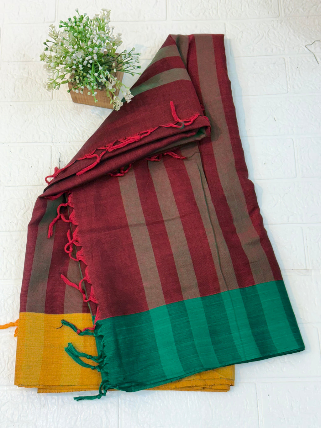 Name: Dual Tone Handloom Cotton Saree with contrast green and mustard borders and subtle woven stripes