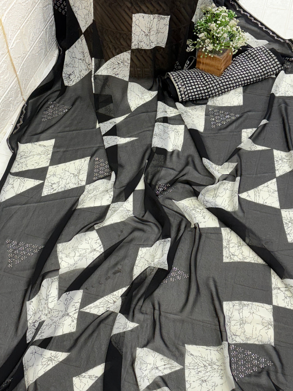 Name: Monochrome Geo Saree fabric pure georgette blend featuring geometric block patterns and subtle sequin accents for a chic contemporary look.