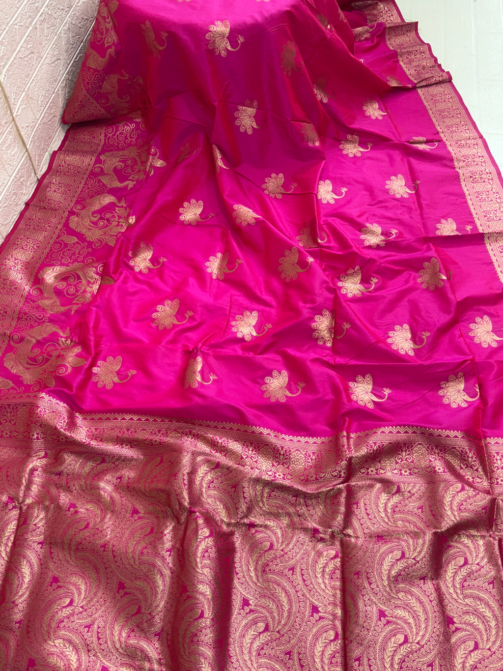 Name: Banarasi Silk Brocade Saree Silk with intricate Zari (metallic thread) Brocade weaving. (The specific silk is often Katan Silk or a silk blend) sarees are best for festival