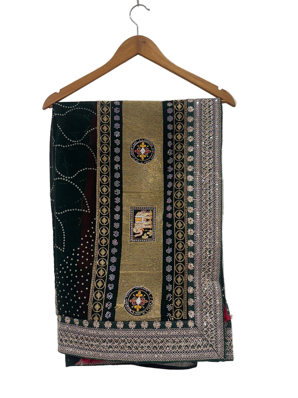 Name: Emerald Bandhej saree Traditional georgette saree featuring intricate bandhej patterns with golden zari and ethnic motif border.